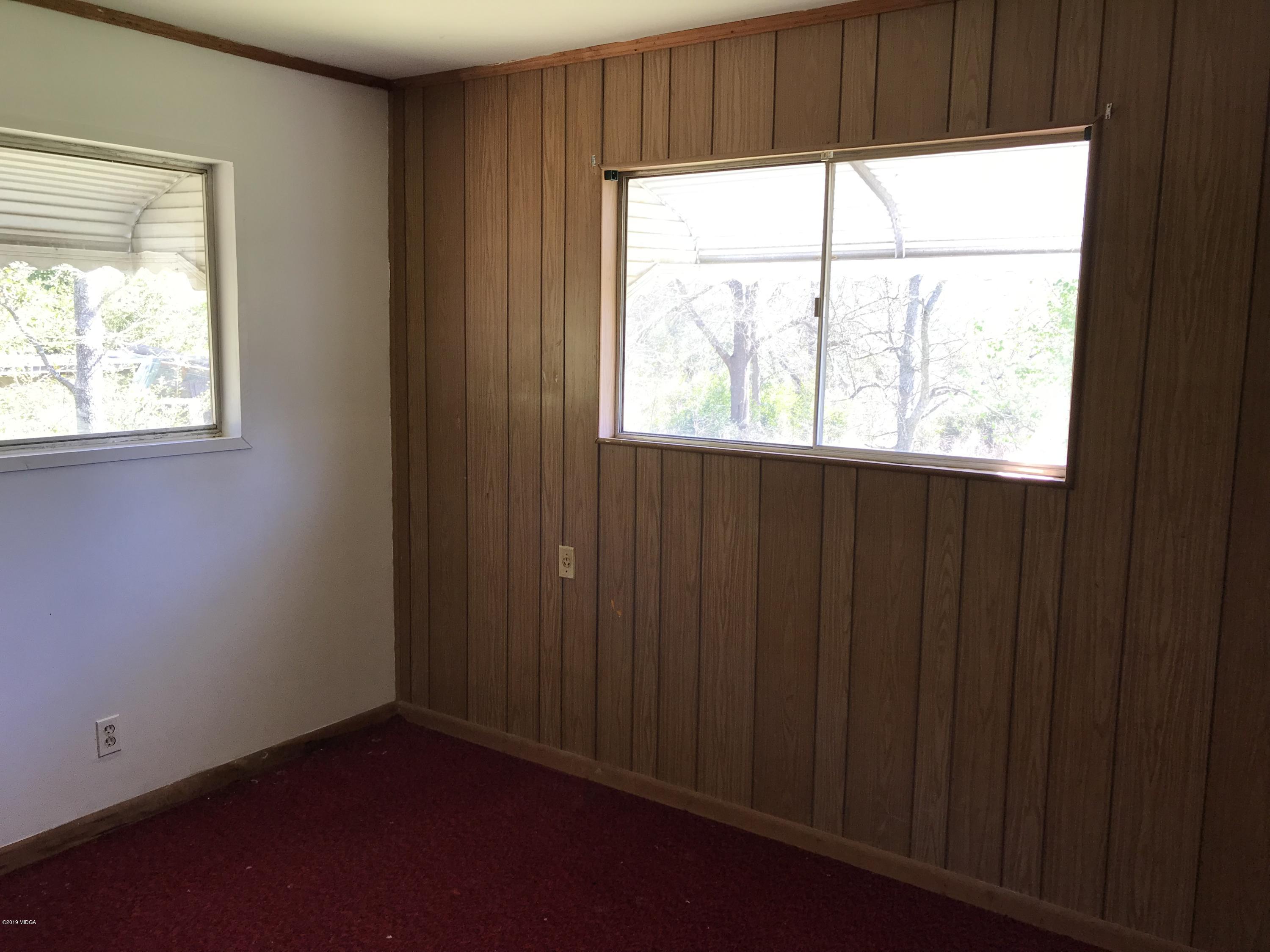 224 Chambers Road Macon, GA 31217 - Photo 7 of 16 a view of an empty room with a window