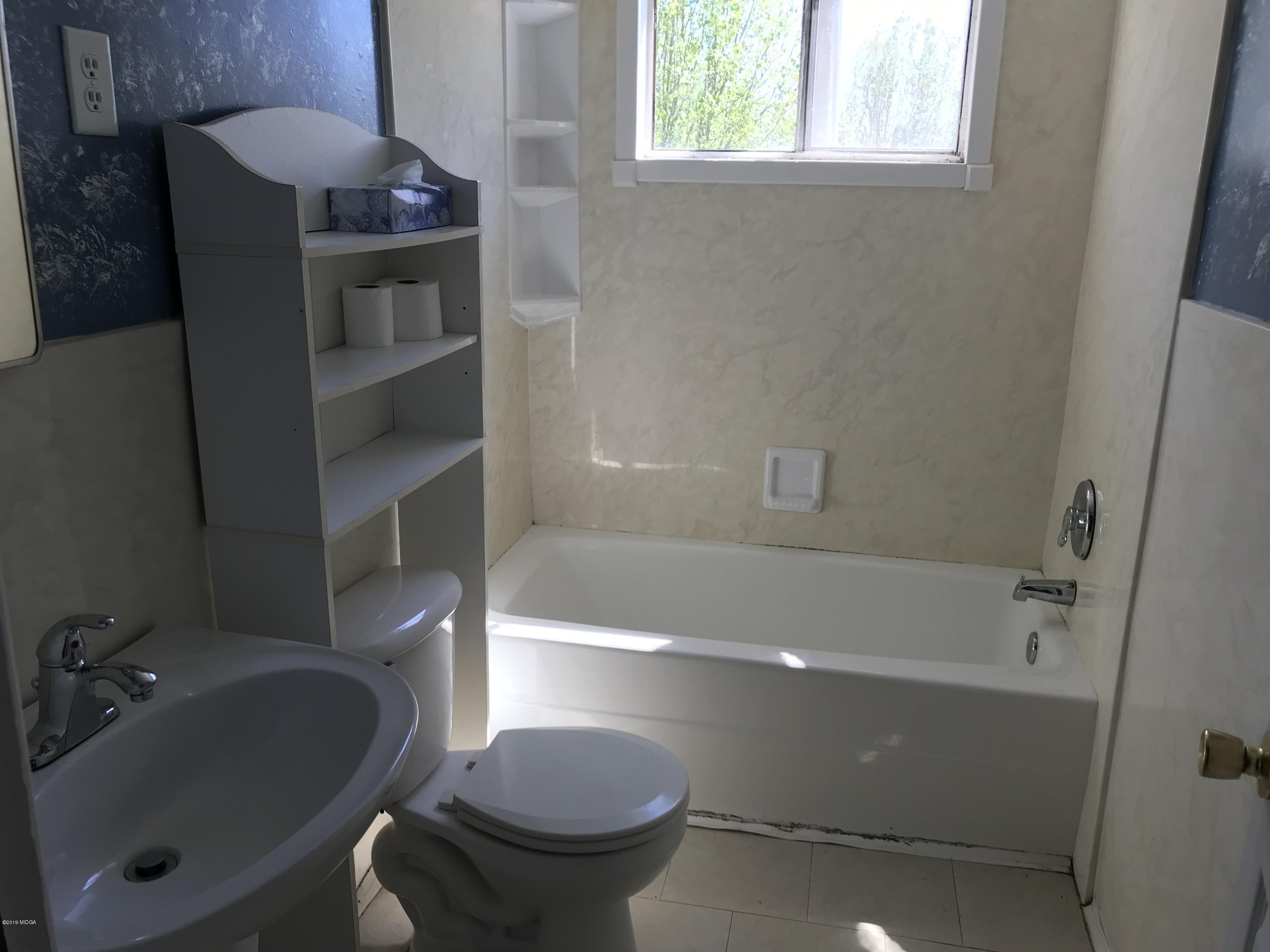 224 Chambers Road Macon, GA 31217 - Photo 8 of 16 a bathroom with a sink and a toilet
