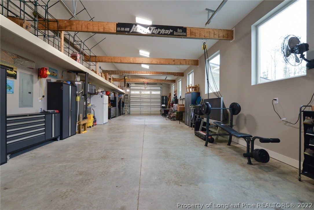 5671 Stewart Road Godwin, NC 28344 - Photo 26 of 45 a view of a room with gym equipment