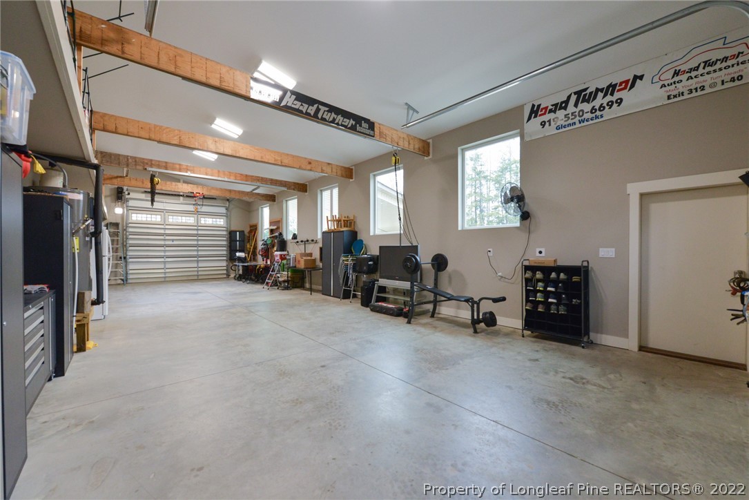 5671 Stewart Road Godwin, NC 28344 - Photo 27 of 45 a view of a room with gym equipment