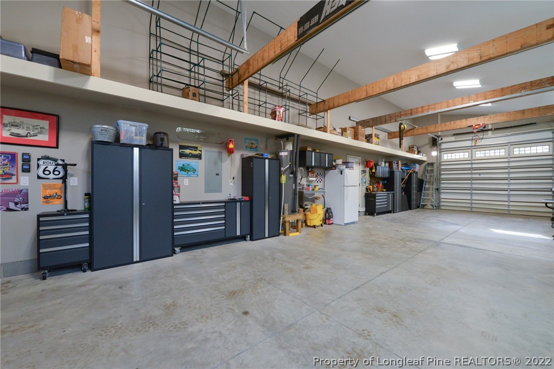 5671 Stewart Road Godwin, NC 28344 - Photo 28 of 45 a view of empty room with wooden floor