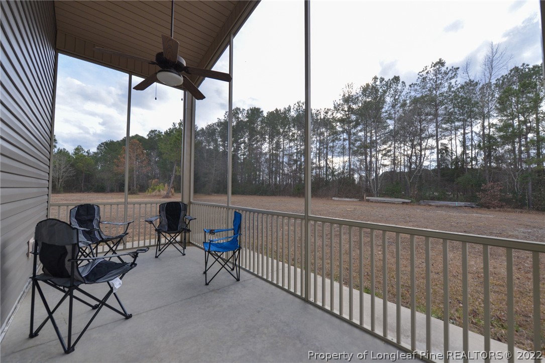 5671 Stewart Road Godwin, NC 28344 - Photo 34 of 45 a view of backyard with sitting area