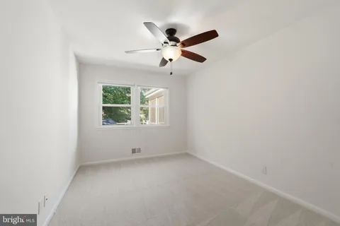 a view of a room with an entryway