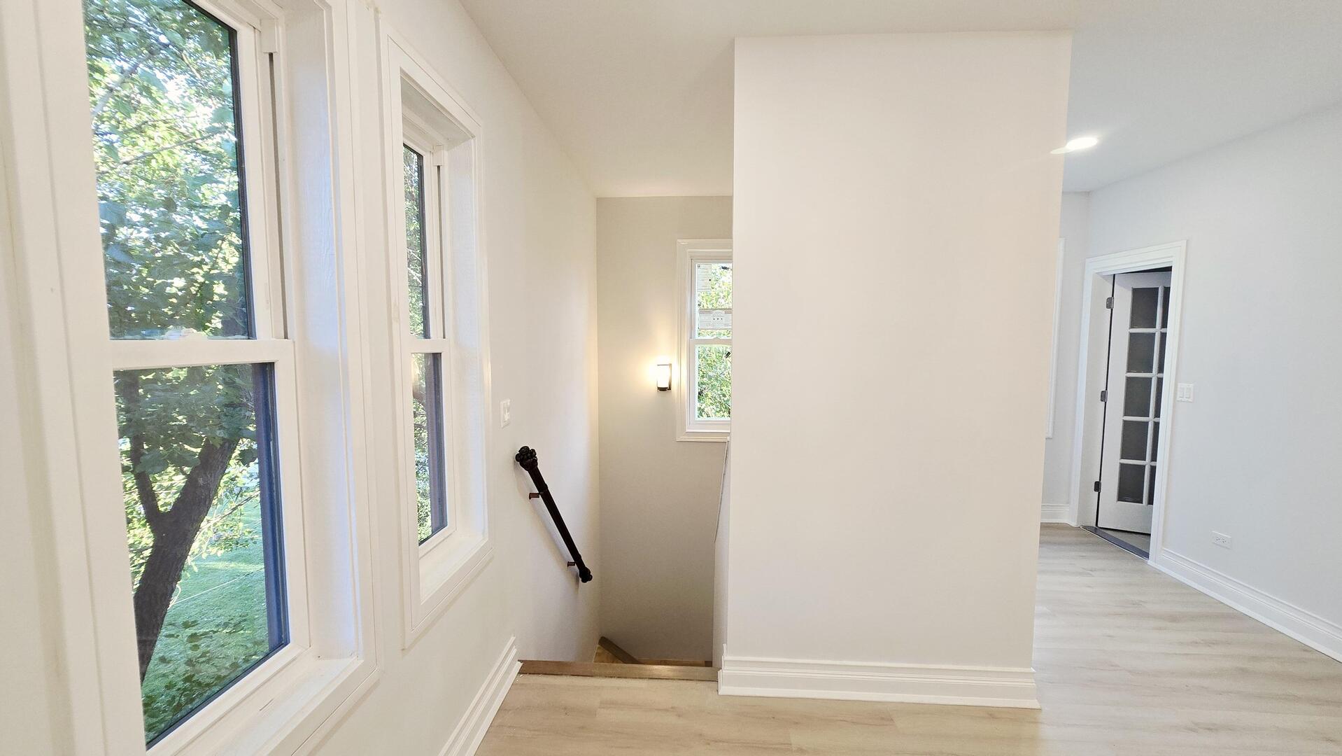 5936 West Maple Avenue Berkeley, IL 60163 - Photo 12 of 25 a view of a hallway with windows and entryway