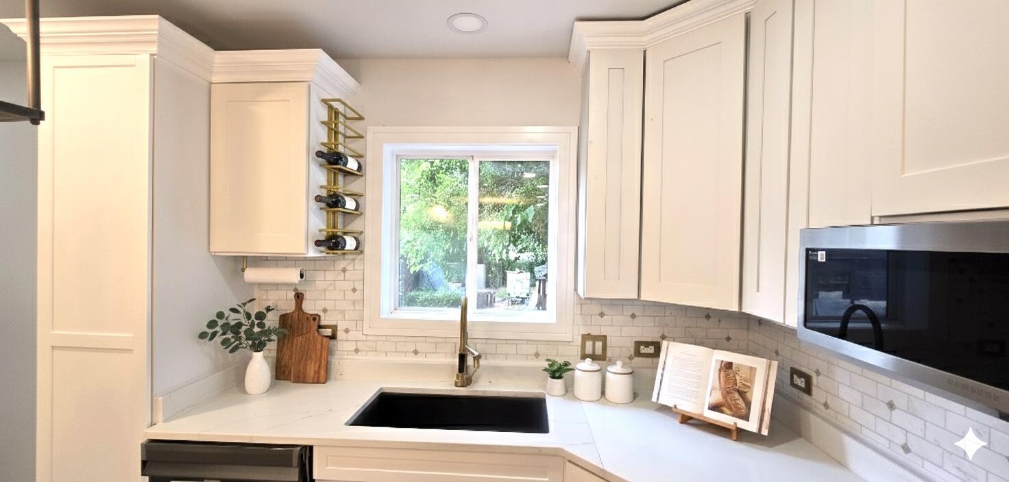 5936 West Maple Avenue Berkeley, IL 60163 - Photo 7 of 25 a kitchen with a sink a window and a counter top space