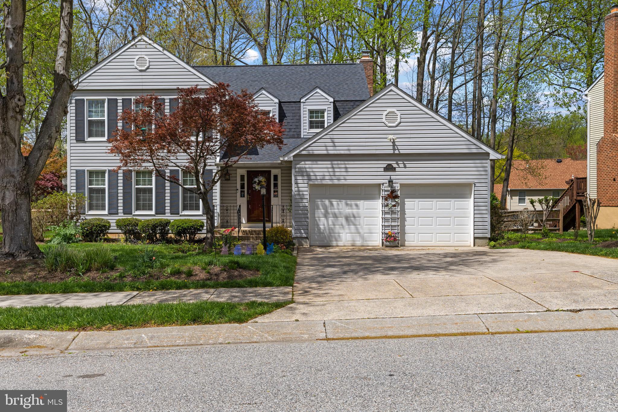 6030 Watch Chain Way Columbia, MD 21044 - Photo 1 of 90 a front view of a house with a yard and garage