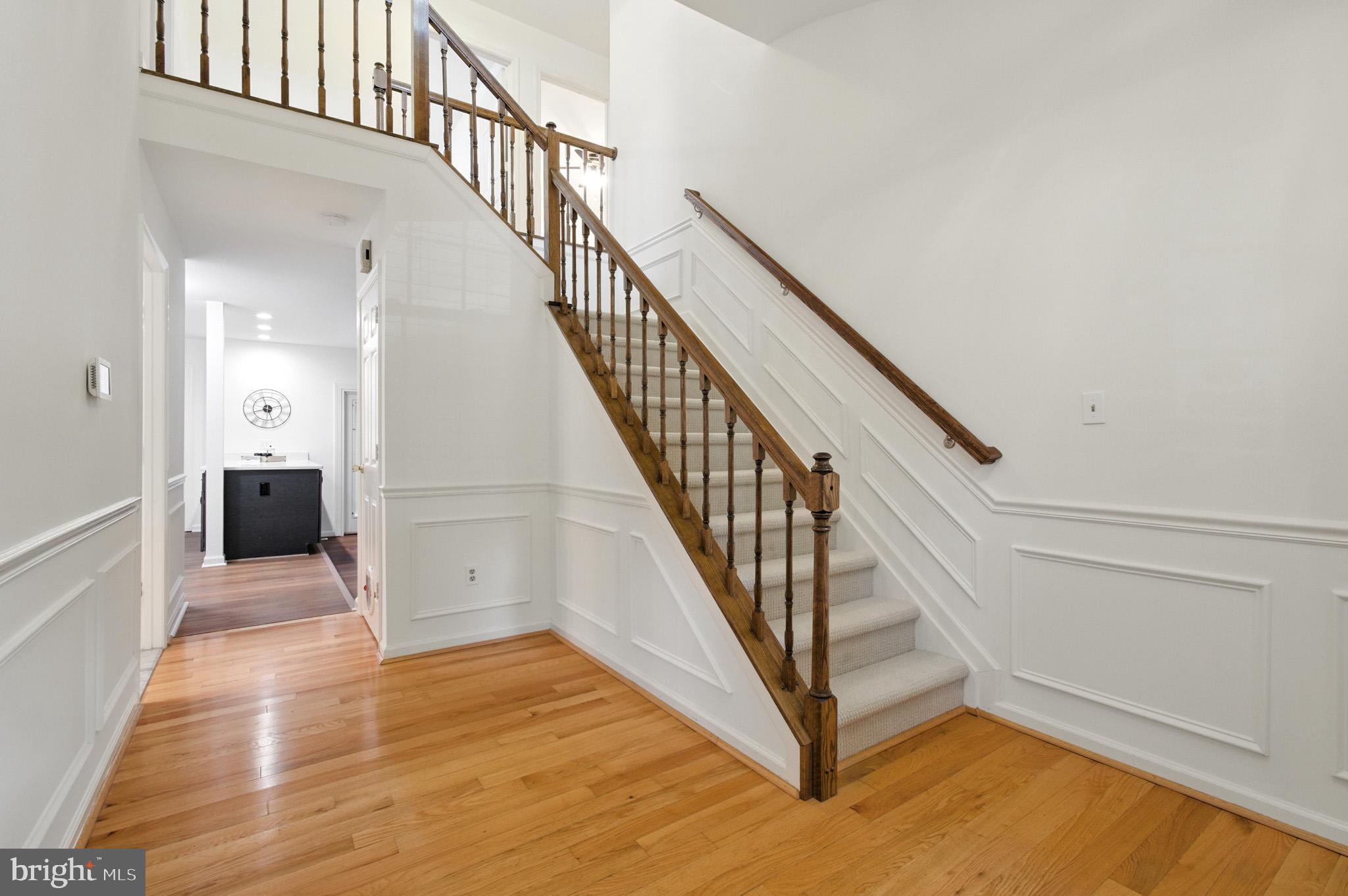 6030 Watch Chain Way Columbia, MD 21044 - Photo 14 of 90 a view of staircase with white walls and windows