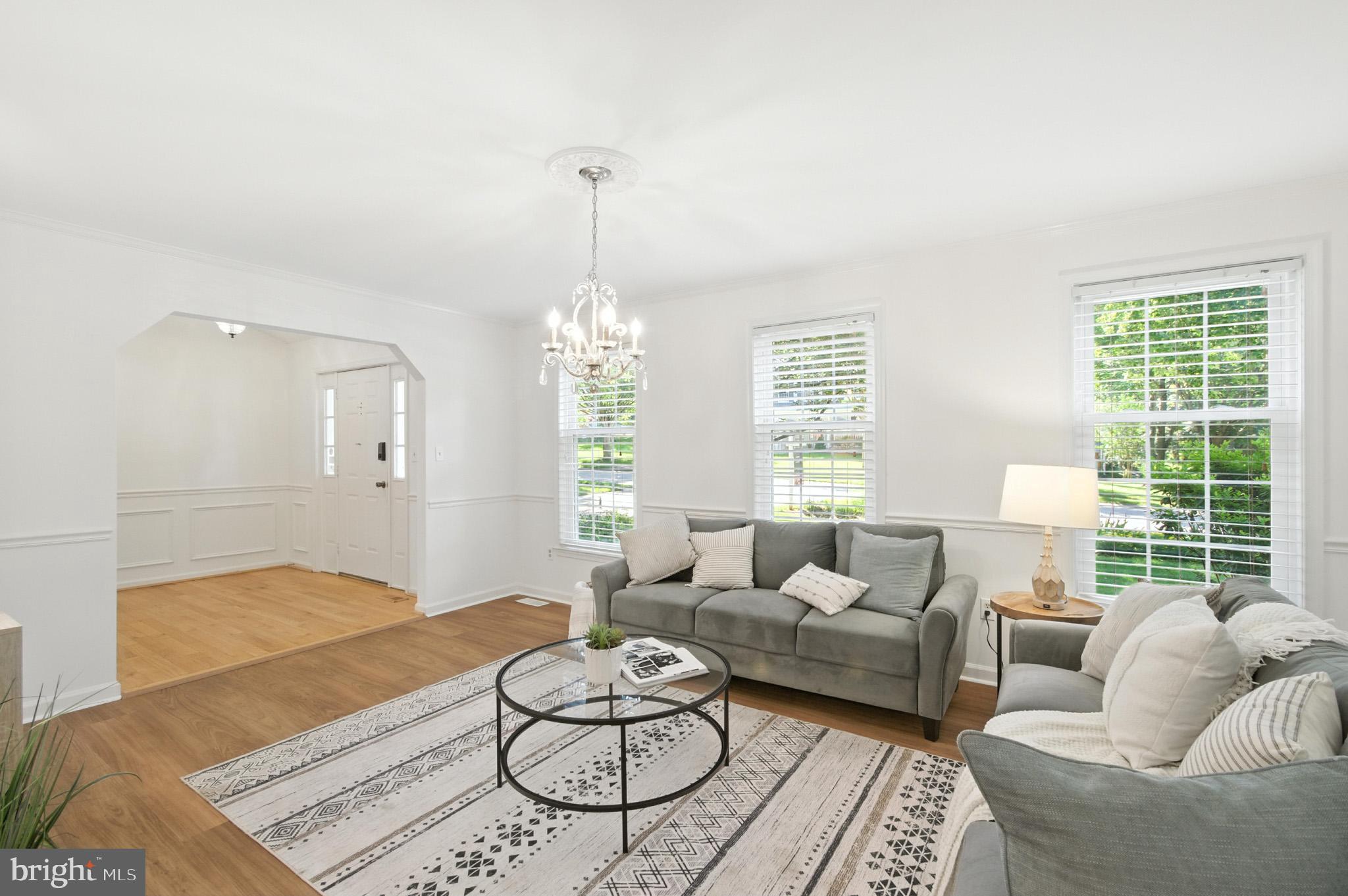 6030 Watch Chain Way Columbia, MD 21044 - Photo 17 of 90 a living room with furniture and a large window