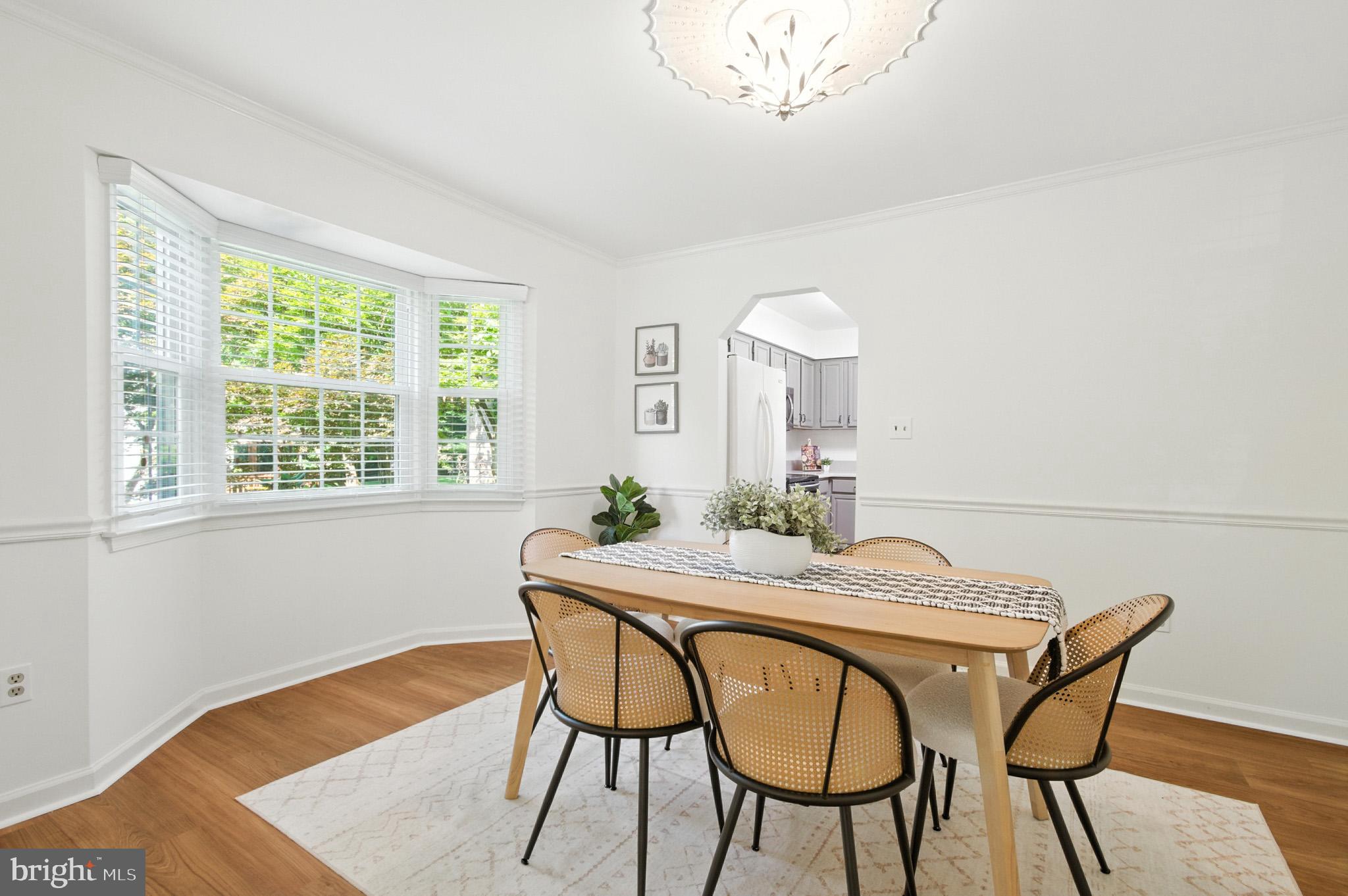 6030 Watch Chain Way Columbia, MD 21044 - Photo 19 of 90 a dining room with furniture and window