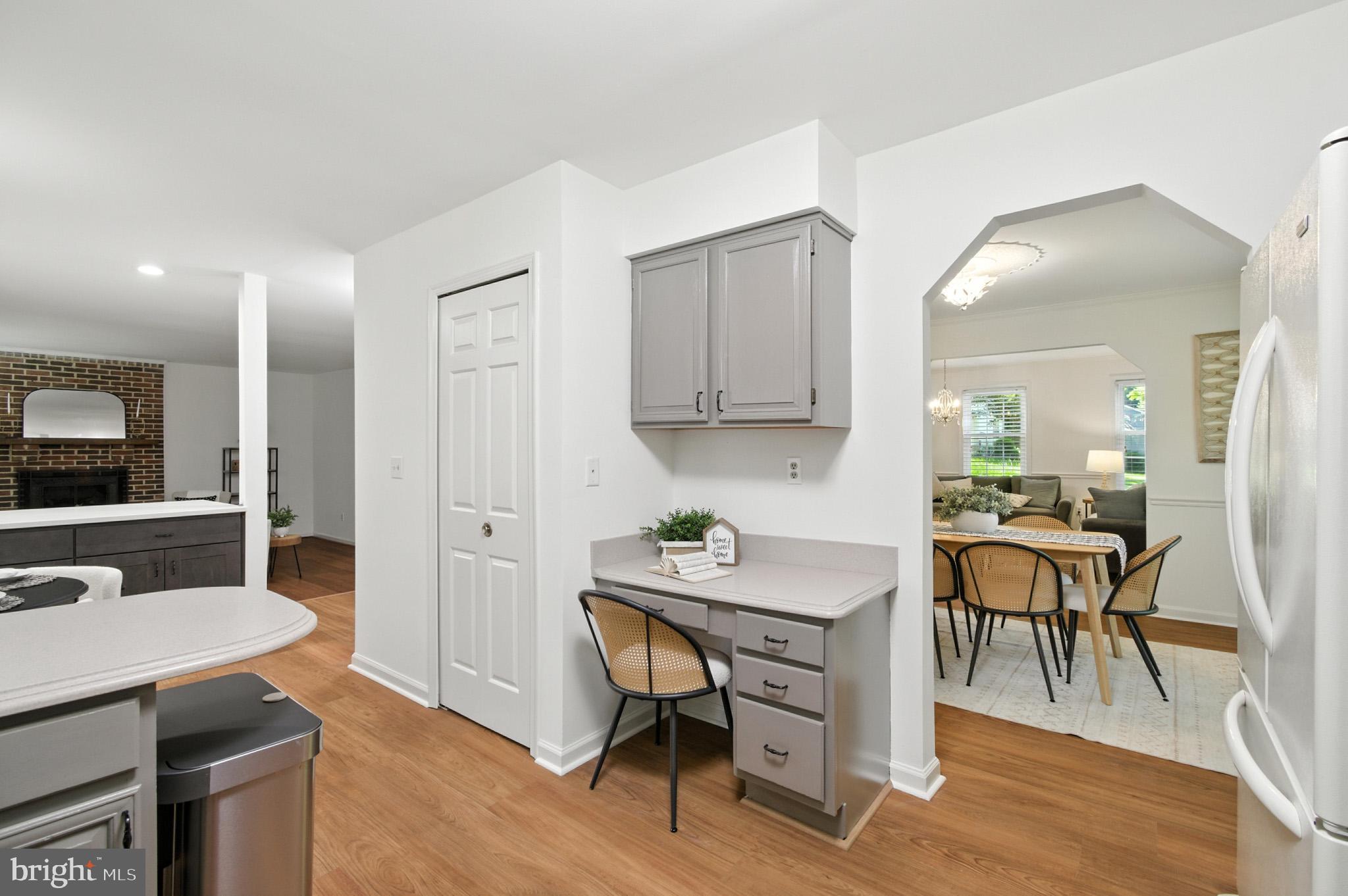 6030 Watch Chain Way Columbia, MD 21044 - Photo 27 of 90 a view of a dining room with furniture and wooden floor
