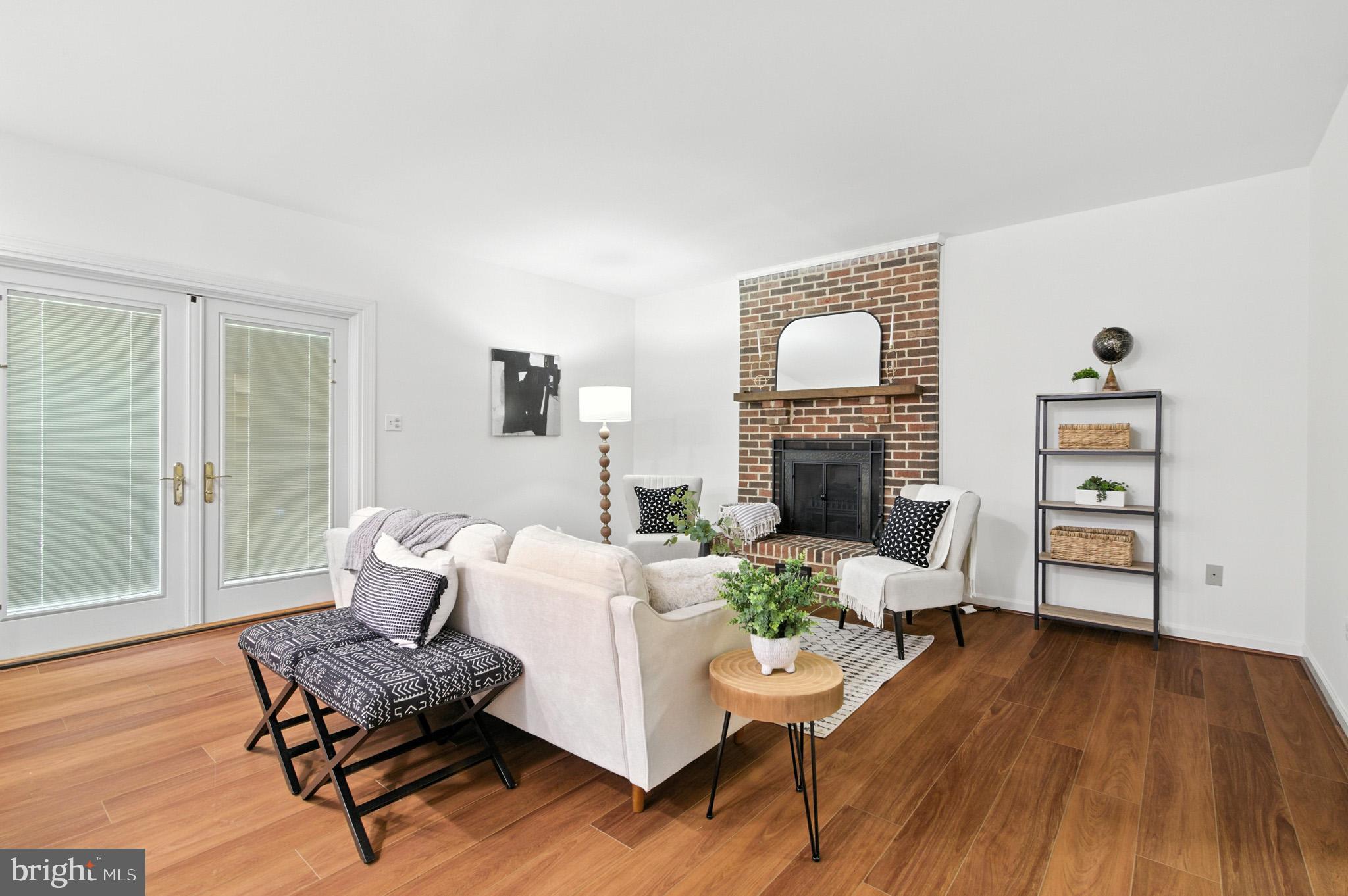 6030 Watch Chain Way Columbia, MD 21044 - Photo 32 of 90 a living room with furniture and a wooden floor