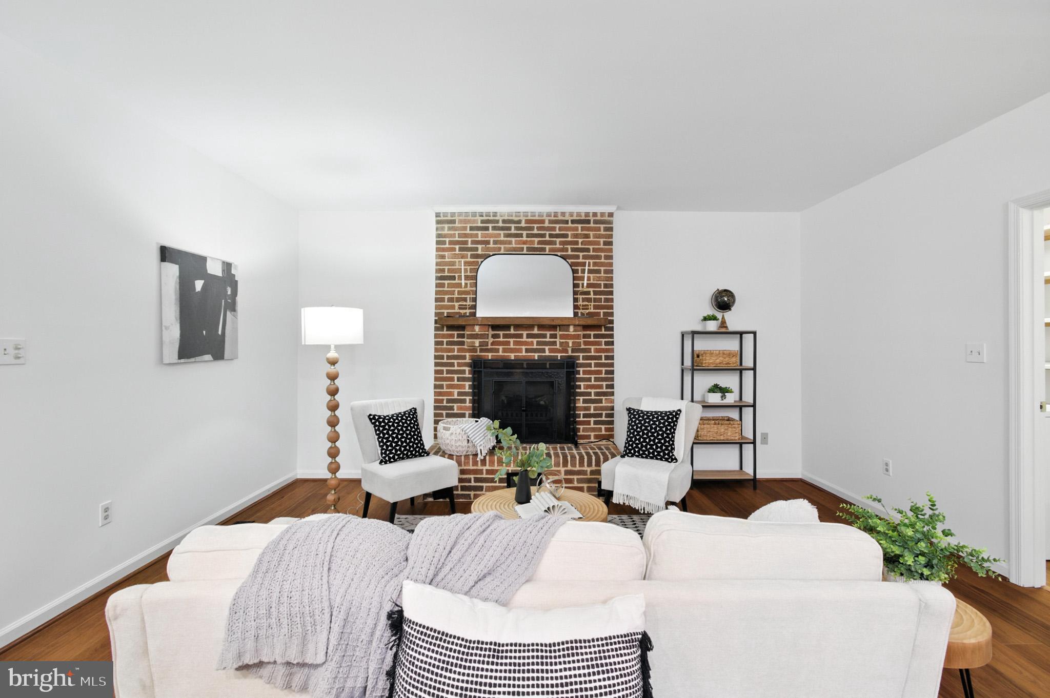 6030 Watch Chain Way Columbia, MD 21044 - Photo 35 of 90 a living room with furniture and a fireplace