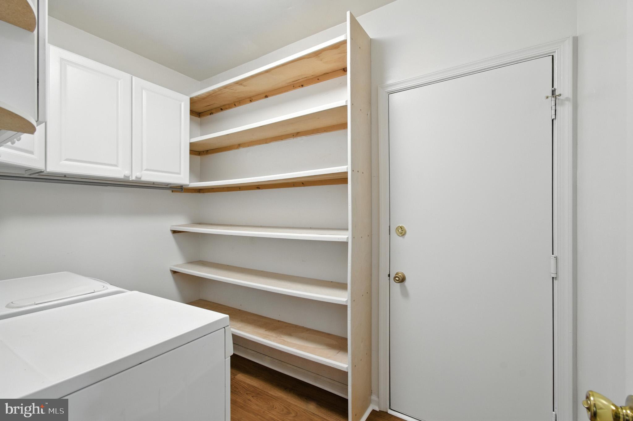 6030 Watch Chain Way Columbia, MD 21044 - Photo 39 of 90 a view of storage and utility room with washer and dryer