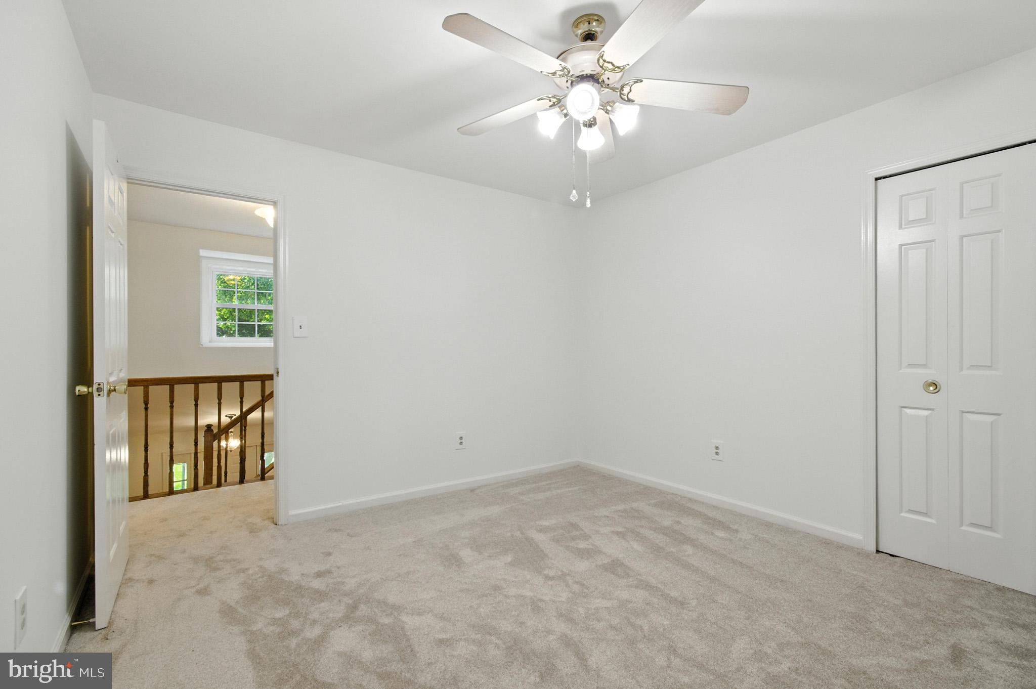6030 Watch Chain Way Columbia, MD 21044 - Photo 55 of 90 an empty room with chandelier fan