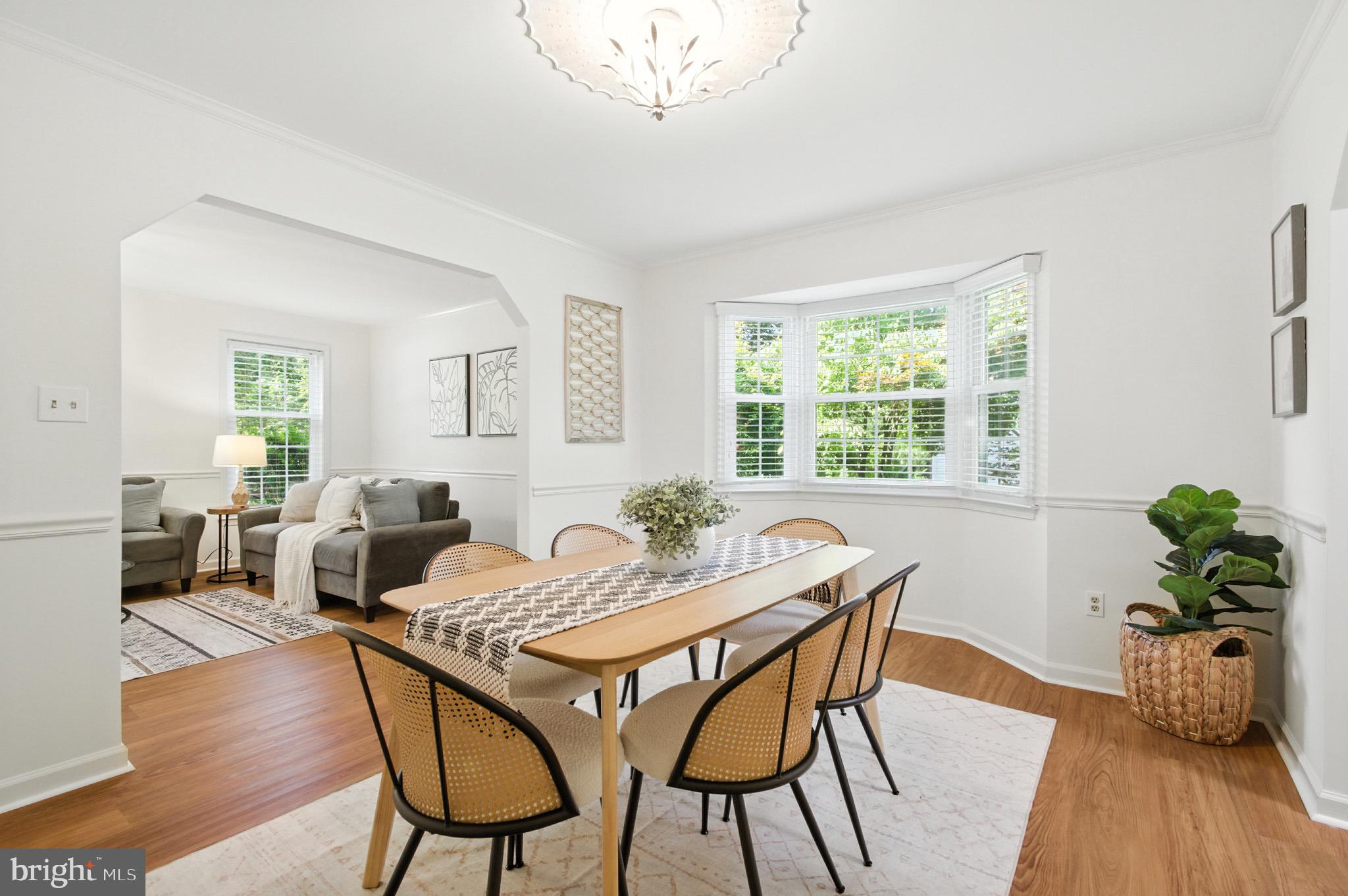 6030 Watch Chain Way Columbia, MD 21044 - Photo 6 of 90 a view of a dining room with furniture window and wooden floor