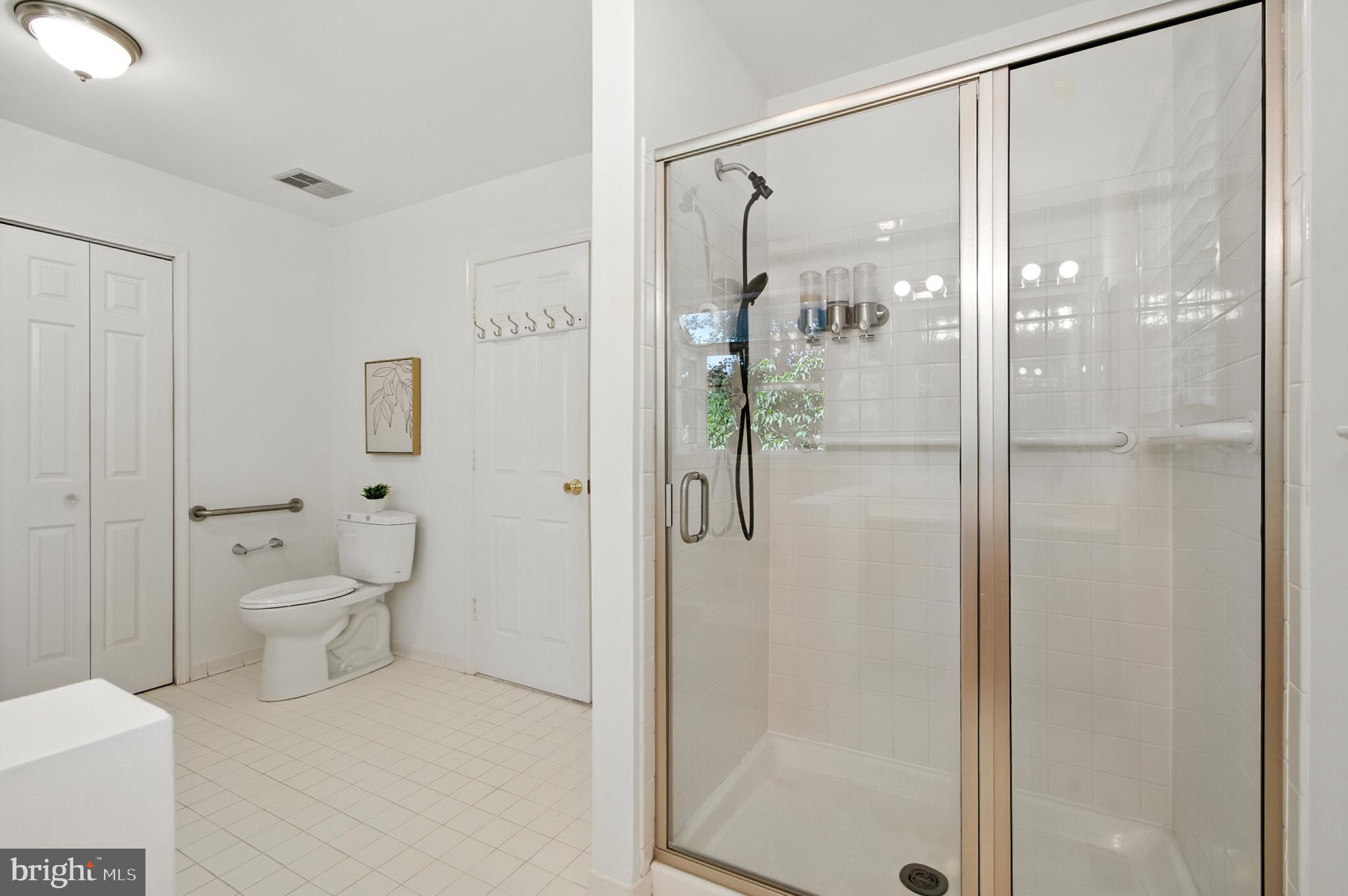 6030 Watch Chain Way Columbia, MD 21044 - Photo 63 of 90 a bathroom with a shower and a toilet