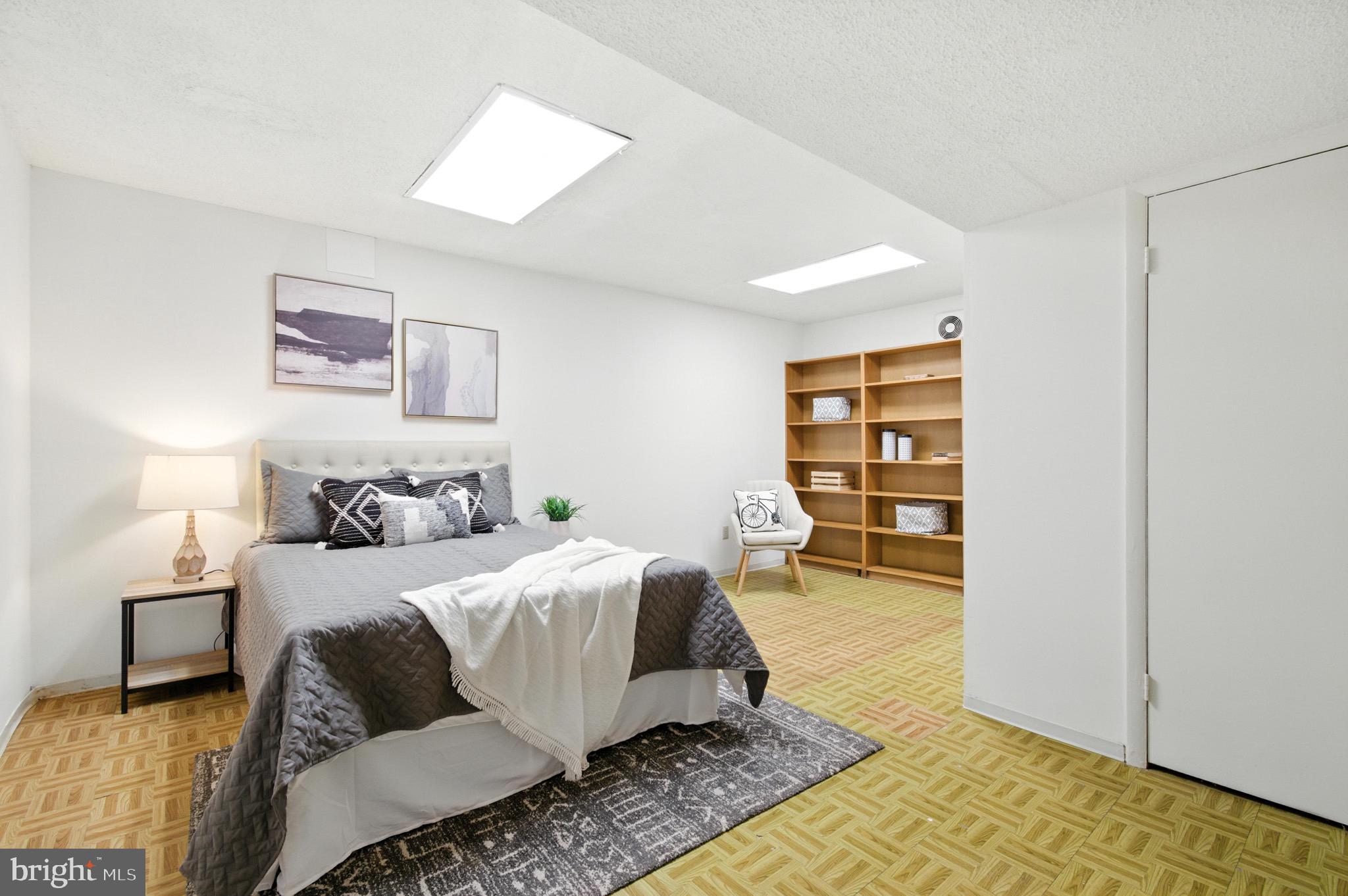 6030 Watch Chain Way Columbia, MD 21044 - Photo 7 of 90 a bedroom with a bed and a couch