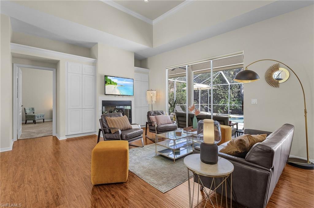 258 Monterey Drive Naples, FL 34119 - Photo 6 of 36 a living room with furniture and a window