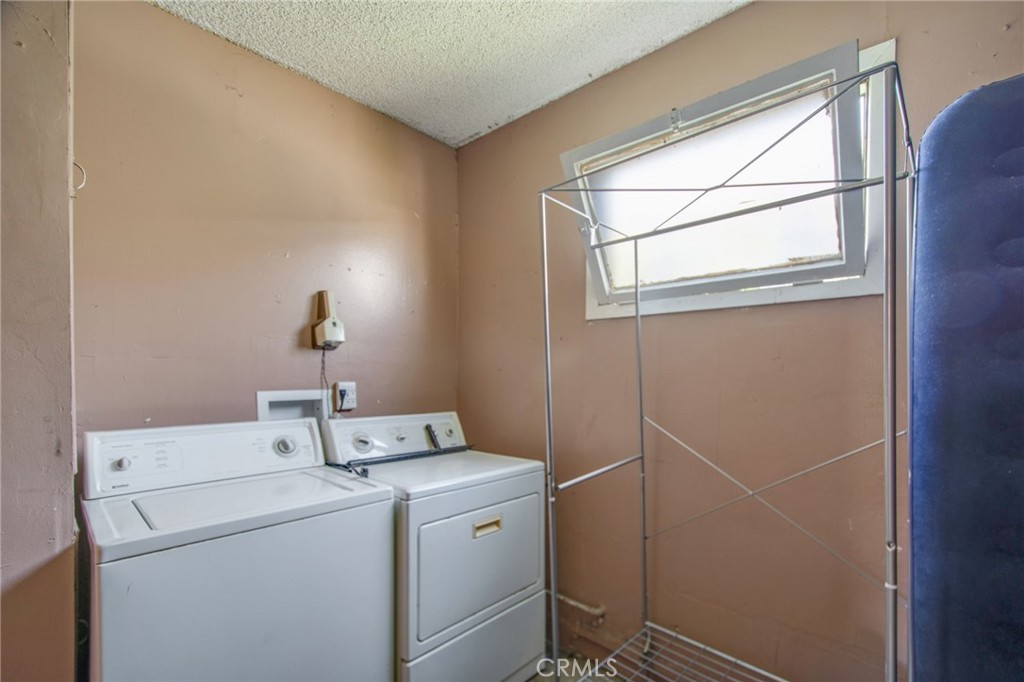 1802 West 153rd Street Compton, CA 90220 - Photo 12 of 20 a utility room with dryer and washer