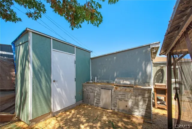 a backyard of a house with seating space