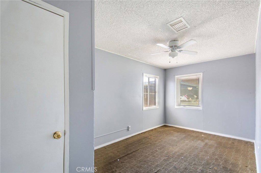 1802 West 153rd Street Compton, CA 90220 - Photo 9 of 20 a view of an empty room with a window