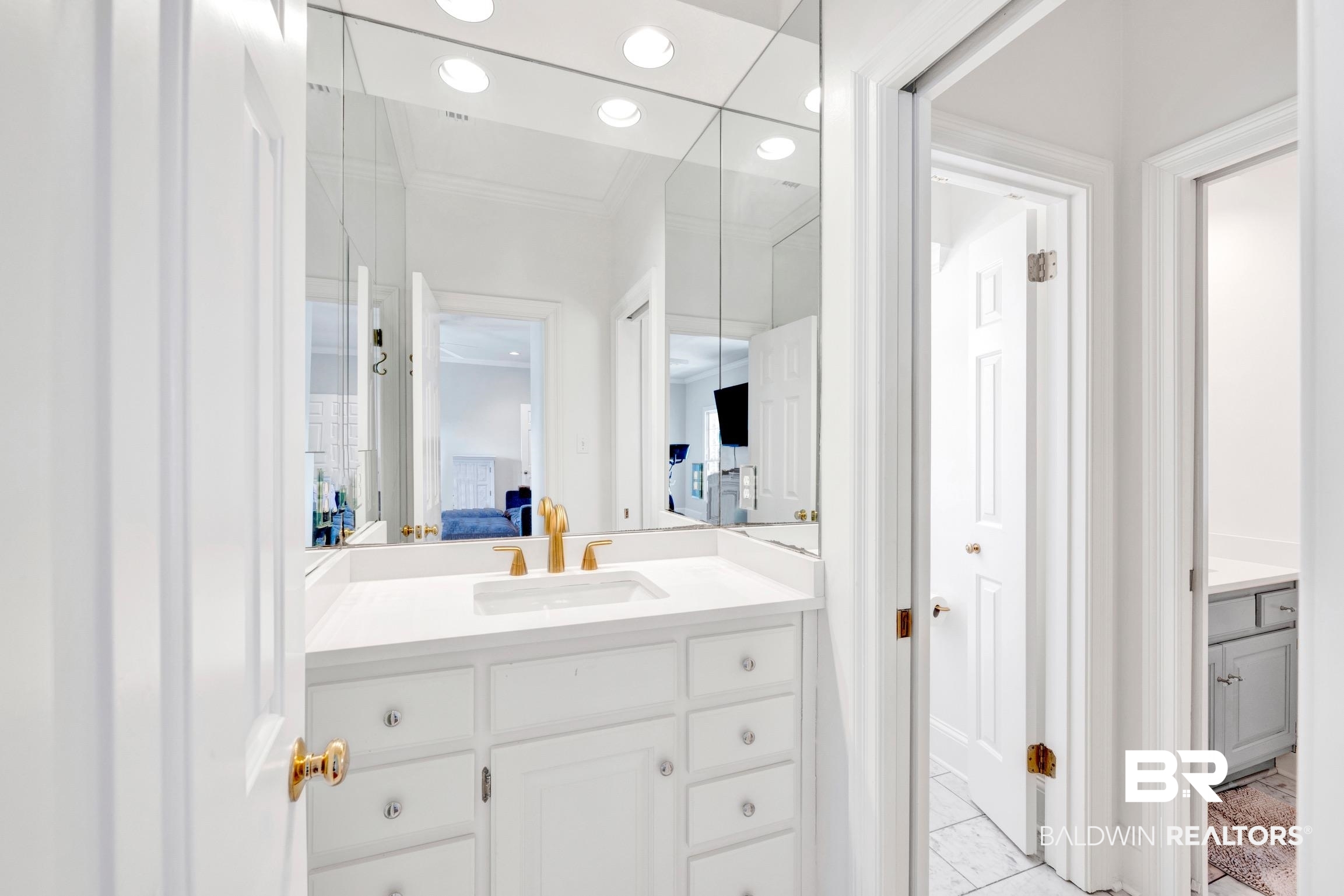 4 Savannah Court Mobile, AL 36608 - Photo 22 of 32 Bathroom with vanity, recessed lighting, light tile patterned flooring, and ornamental molding
