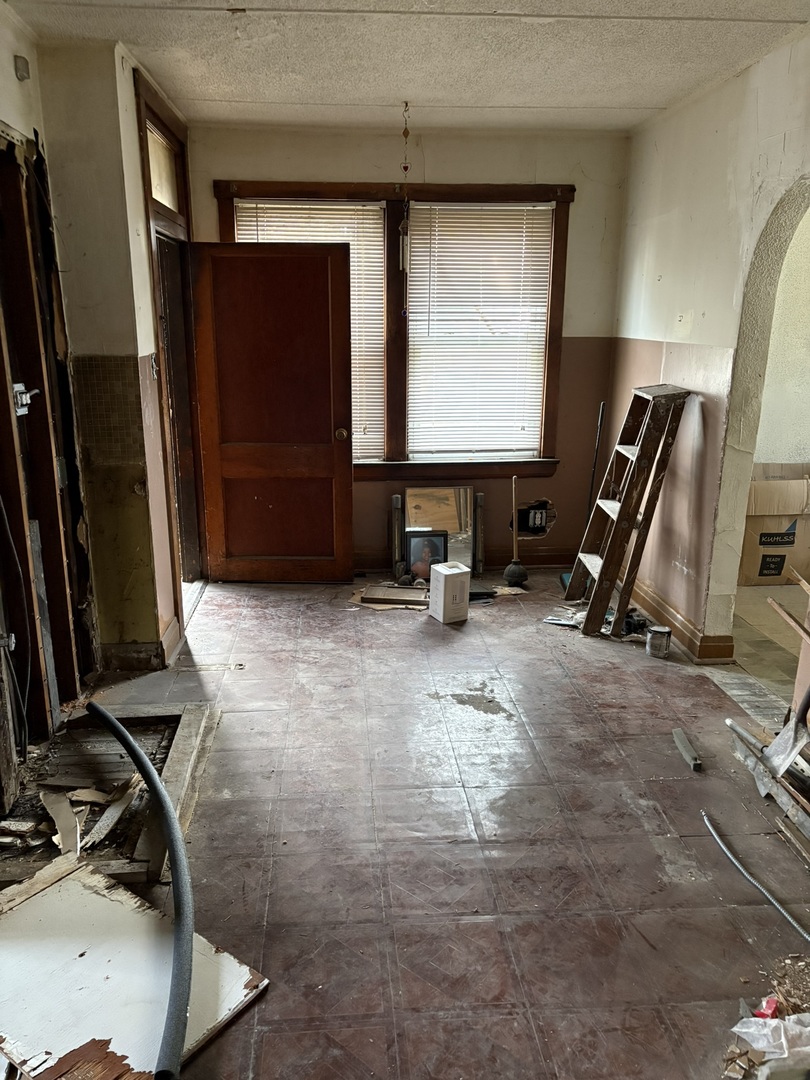 2014 West 52nd Street Chicago, IL 60609 - Photo 32 of 35 a room with gym equipment and a flat screen tv