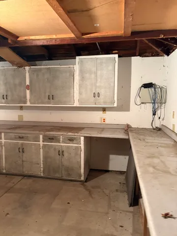 a view of a sink and a microwave