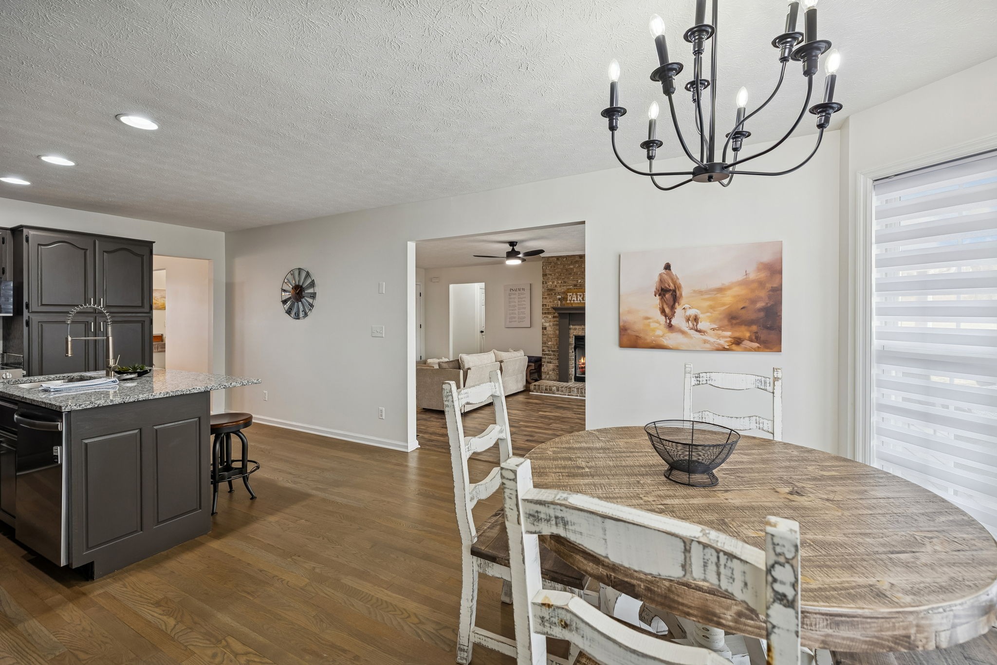 814 Denning Ford Road Portland, TN 37148 - Photo 22 of 99 a view of a dining room with furniture a chandelier and wooden floor
