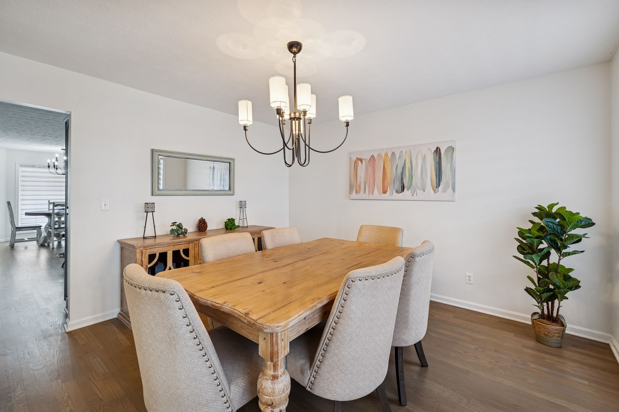 814 Denning Ford Road Portland, TN 37148 - Photo 23 of 99 a view of a dining room with furniture and wooden floor