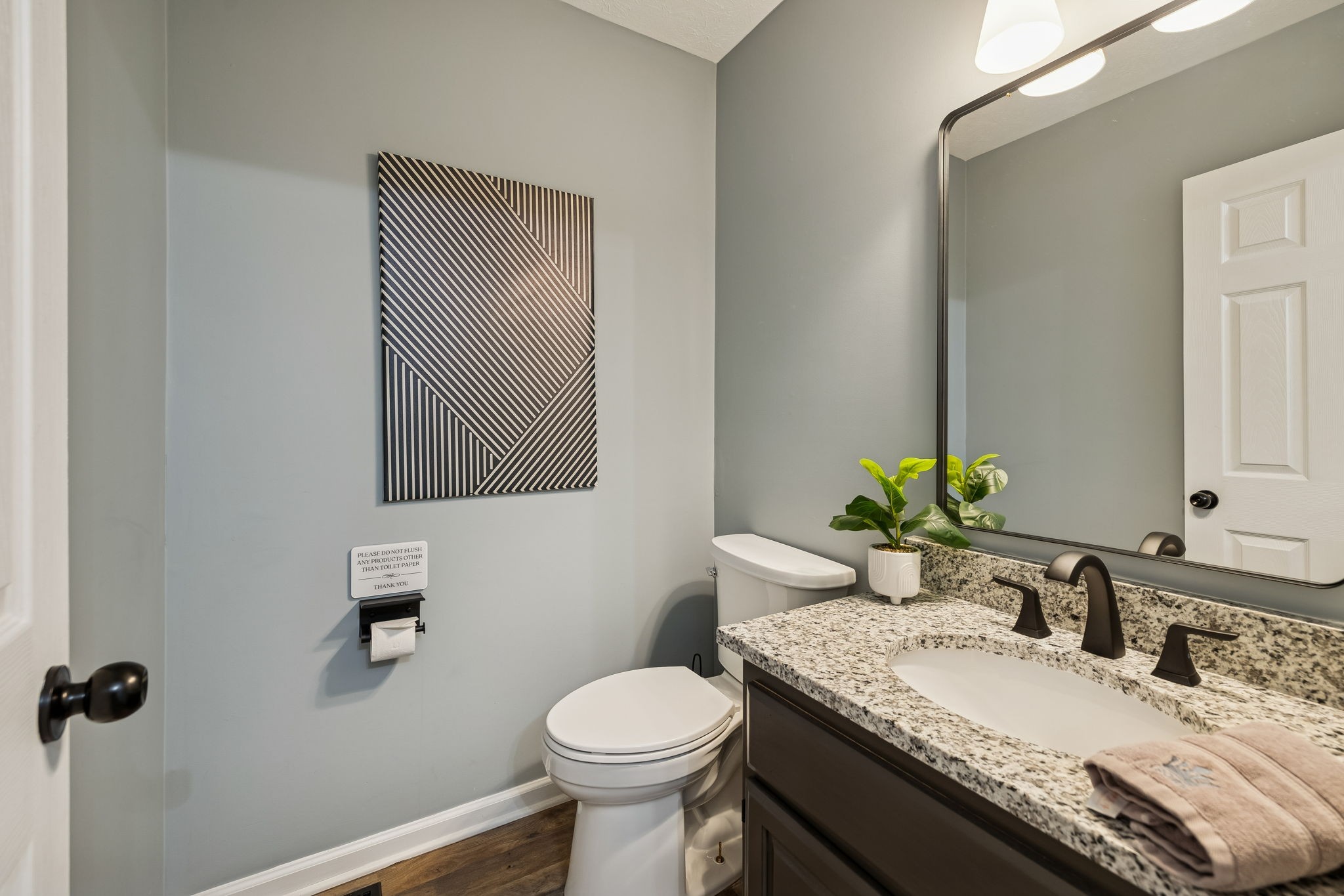 814 Denning Ford Road Portland, TN 37148 - Photo 27 of 99 a bathroom with a granite countertop sink toilet and mirror