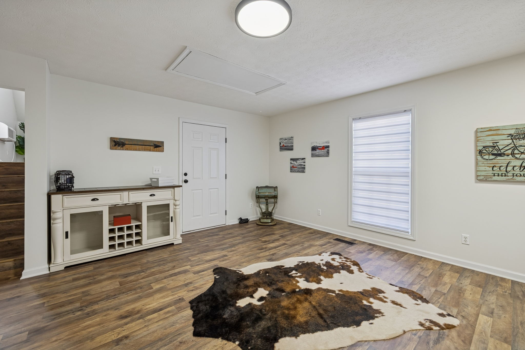 814 Denning Ford Road Portland, TN 37148 - Photo 37 of 99 a bedroom with a bed and a fireplace