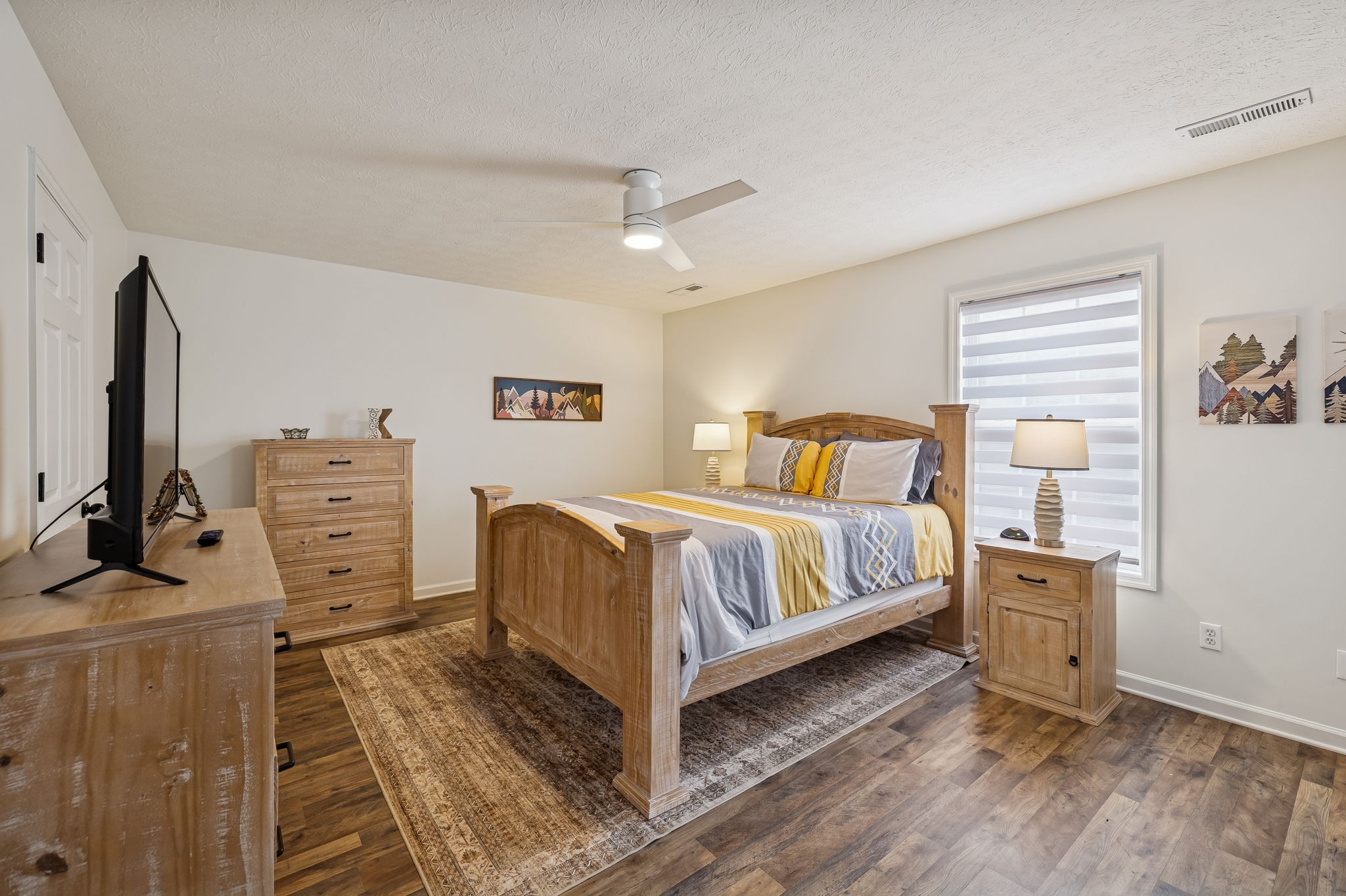 814 Denning Ford Road Portland, TN 37148 - Photo 46 of 99 a bedroom with a bed and furniture