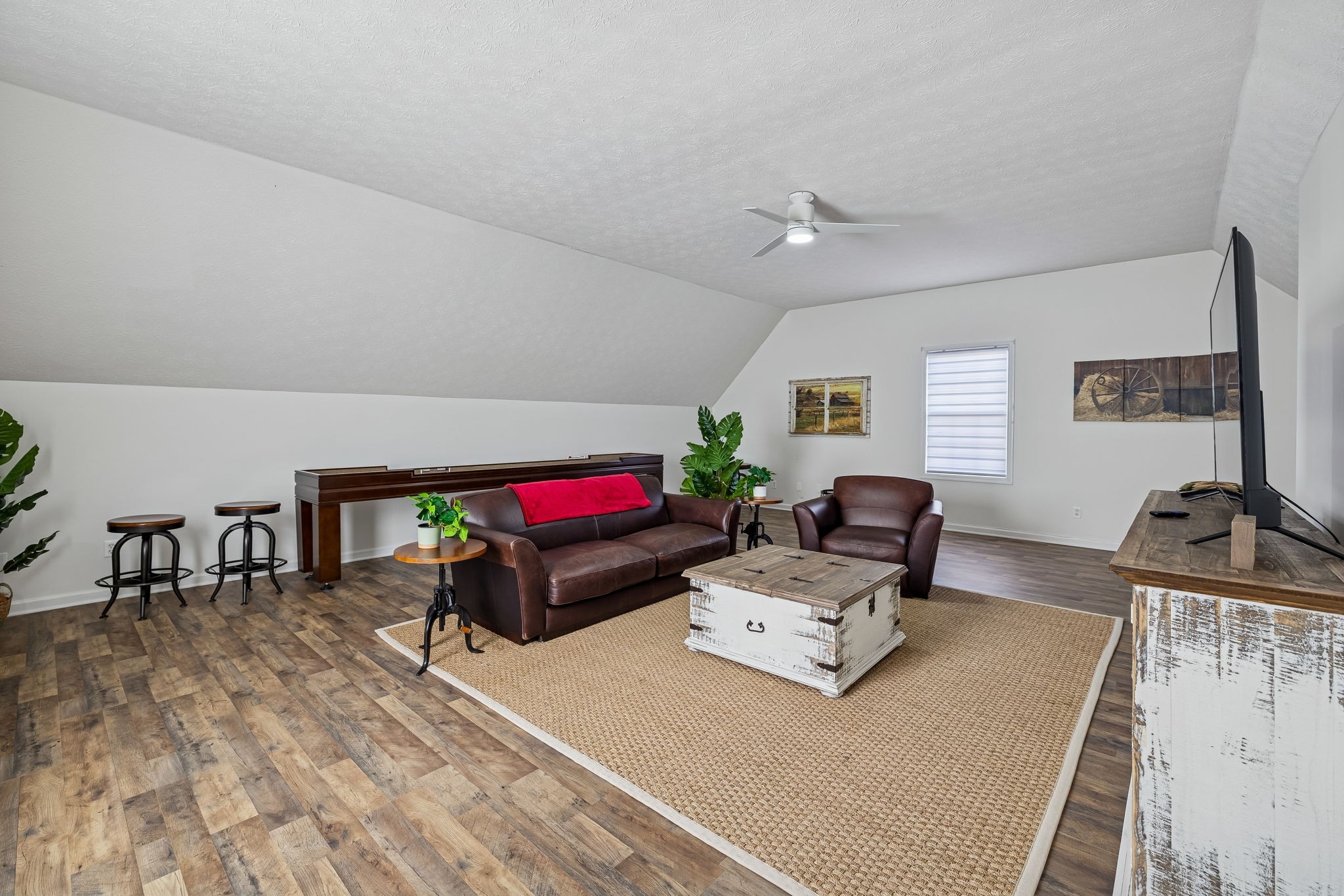 814 Denning Ford Road Portland, TN 37148 - Photo 49 of 99 a living room with furniture and a flat screen tv