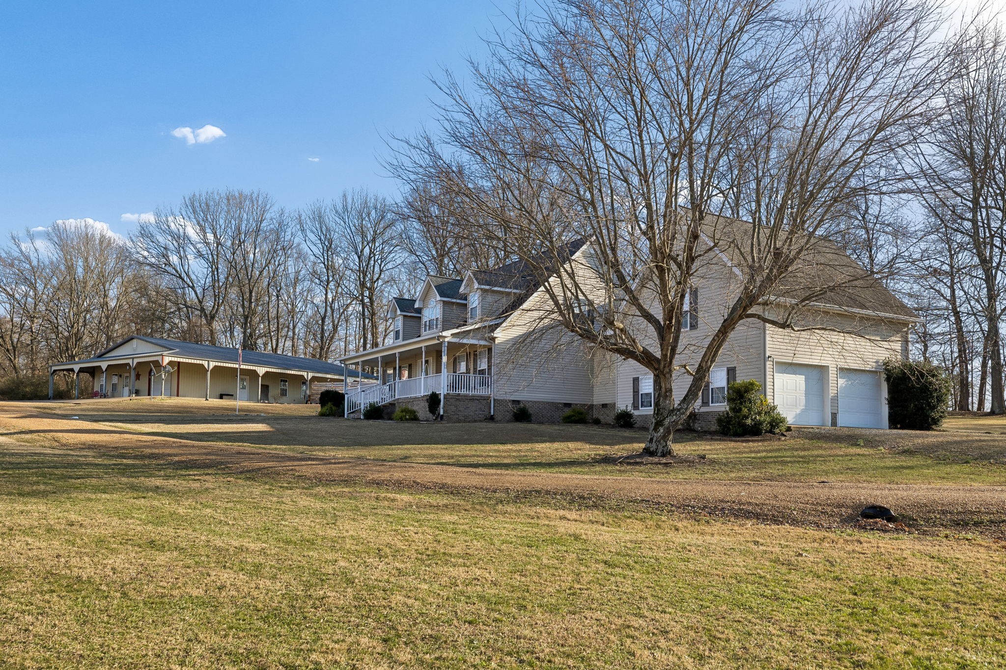 814 Denning Ford Road Portland, TN 37148 - Photo 57 of 99 a view of a house with a yard covered with snow