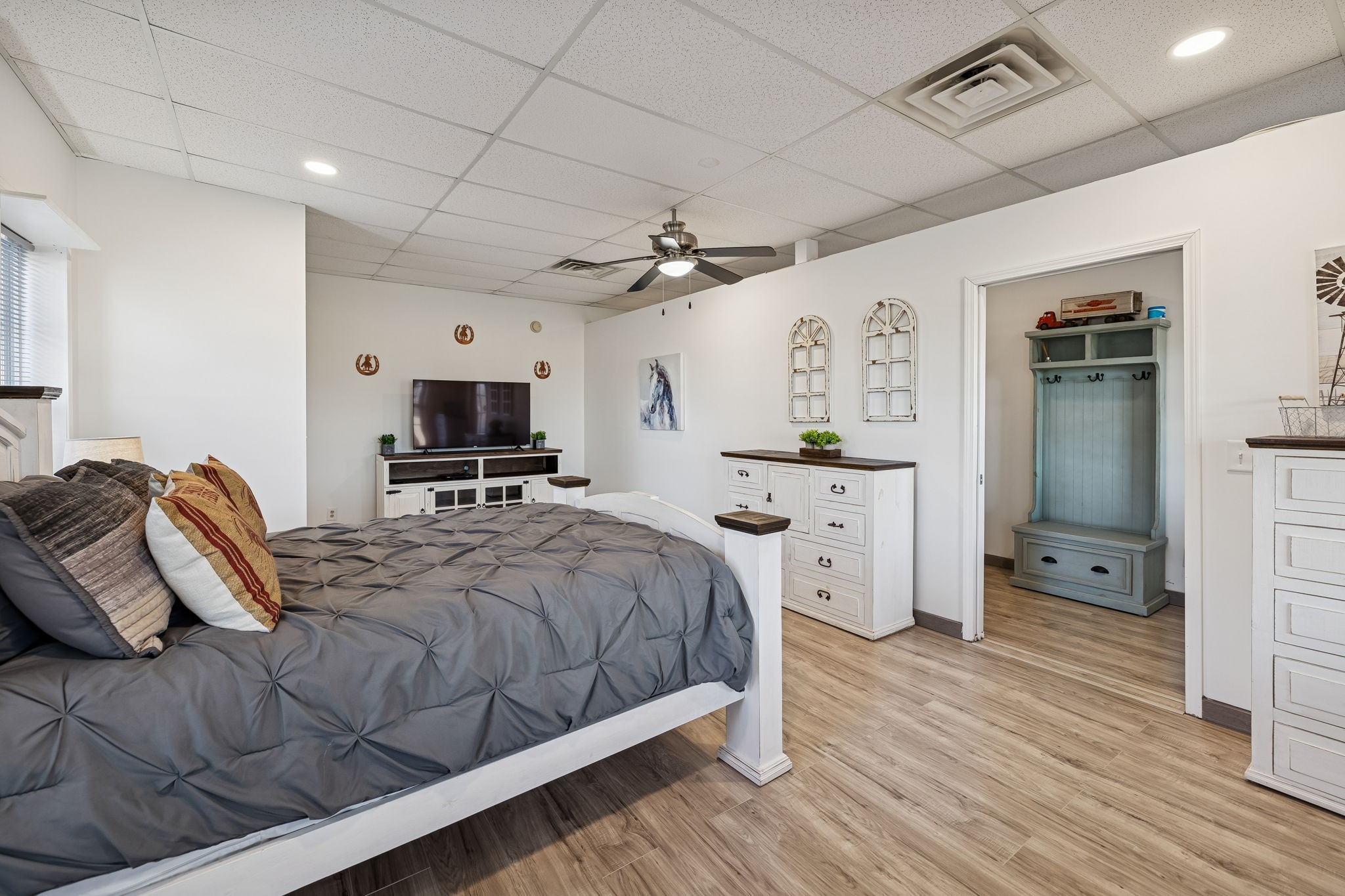 814 Denning Ford Road Portland, TN 37148 - Photo 64 of 99 a bedroom with a bed and a refrigerator