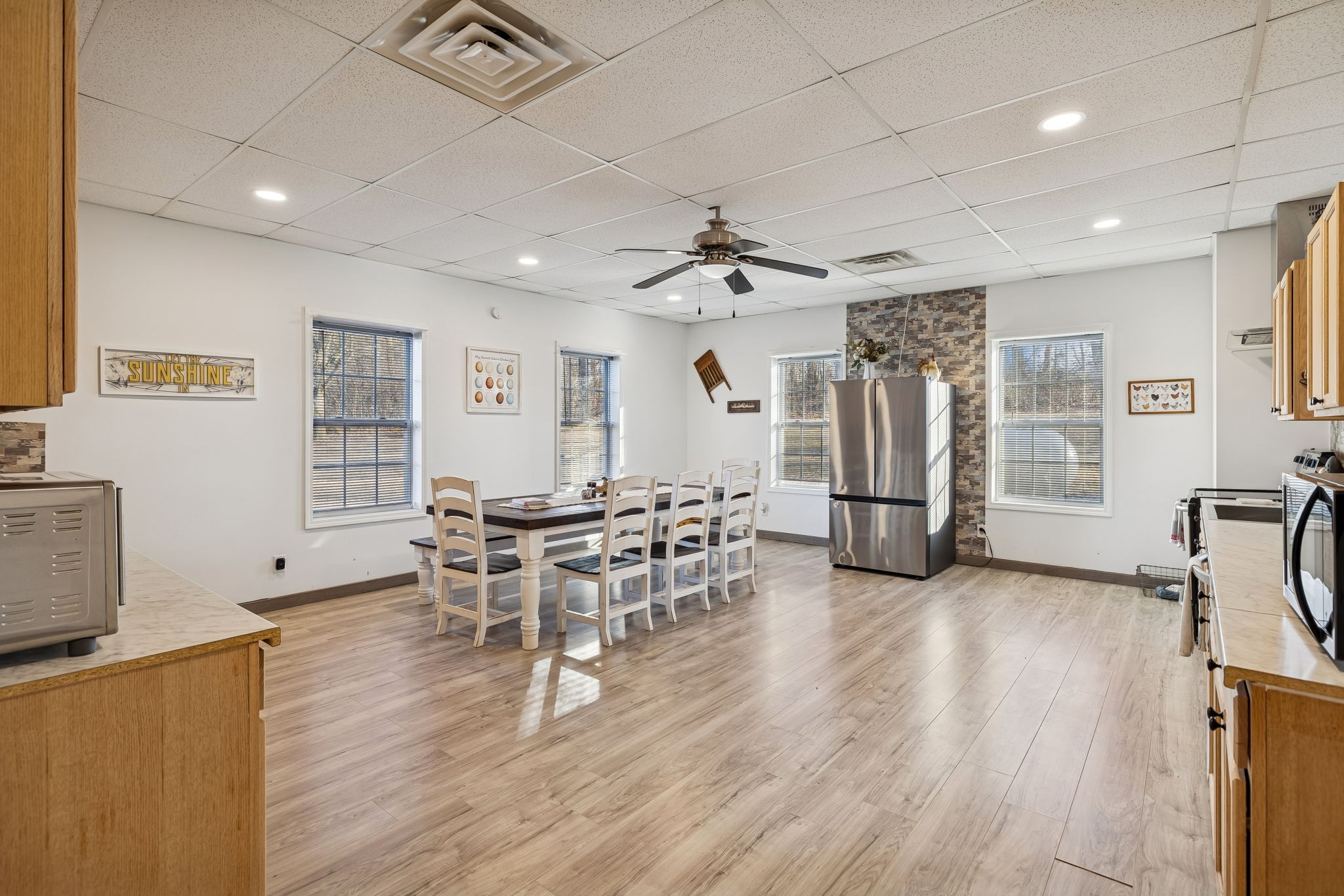 814 Denning Ford Road Portland, TN 37148 - Photo 71 of 99 a view of a dining room with furniture and wooden floor