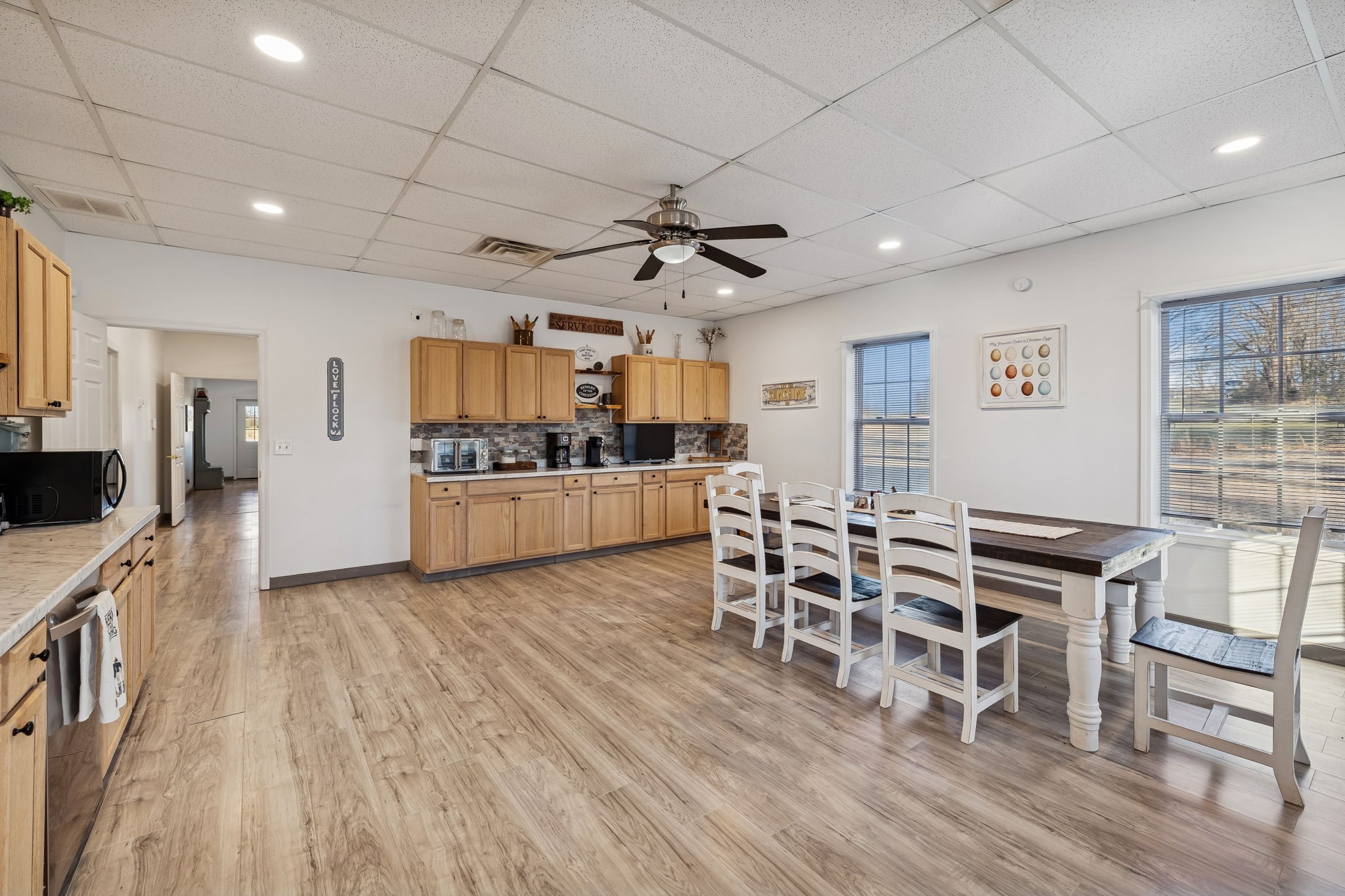 814 Denning Ford Road Portland, TN 37148 - Photo 74 of 99 a view of a dining room with furniture and wooden floor