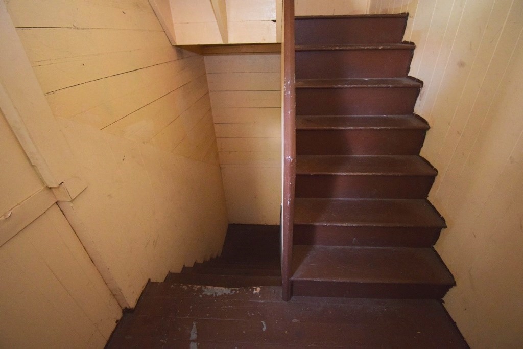 6 Pelham Street Worcester, MA 01609 - Photo 12 of 23 a view of walk in closet with empty racks