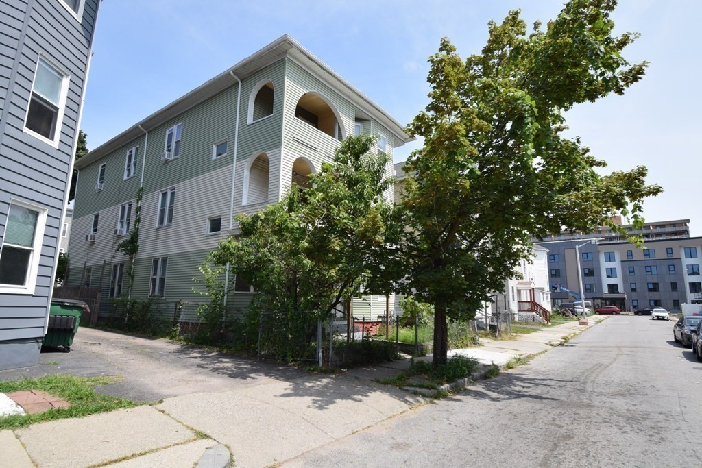6 Pelham Street Worcester, MA 01609 - Photo 15 of 23 a front view of a house with a yard and tree s