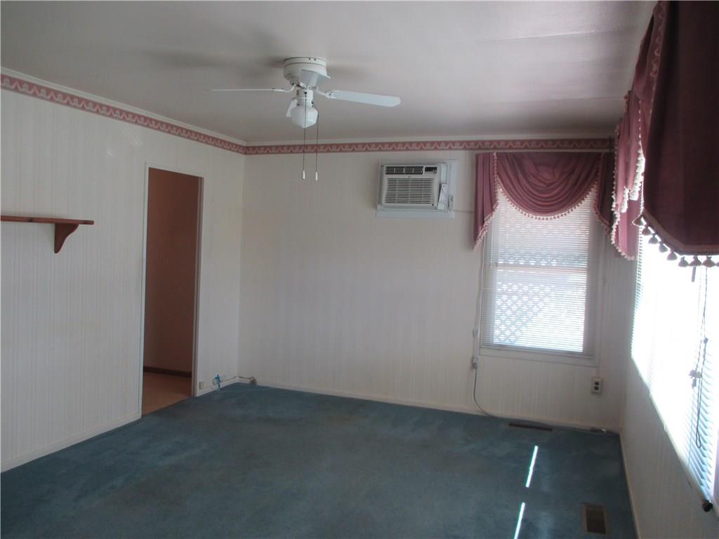 326 Spruce Street Beaver, PA 15009 - Photo 8 of 20 Living room showing access to kitchen