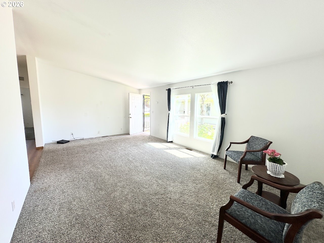 2438 Maia Loop Springfield, OR 97477 - Photo 29 of 32 a living room with furniture and a window