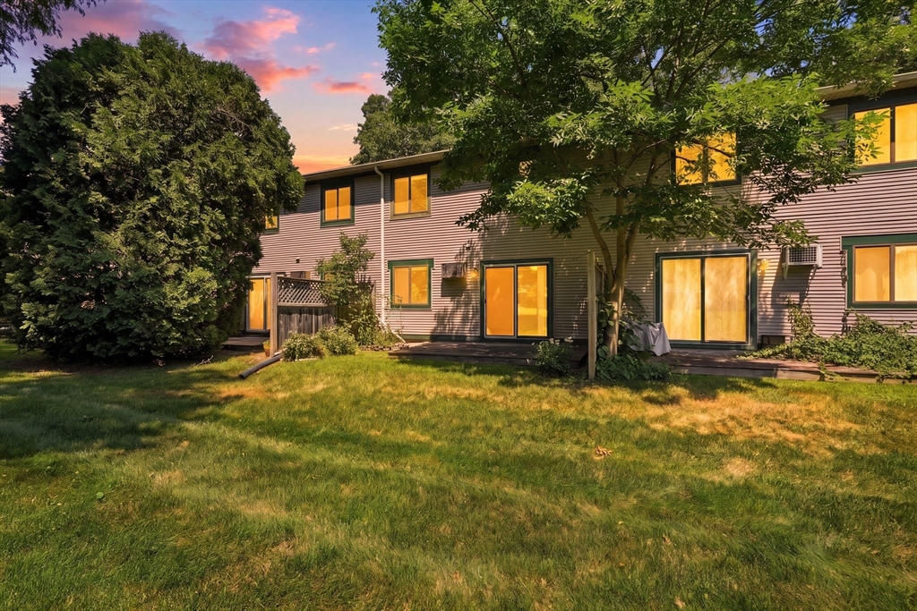 170 East Hadley Road, Unit 96 Amherst, MA 01002 - Photo 35 of 36 a view of a house with a patio