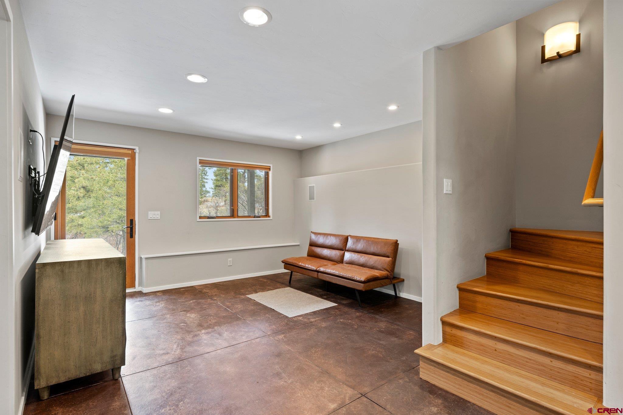 855 Ridge Road Durango, CO 81303 - Photo 21 of 35 a living room with furniture and a window