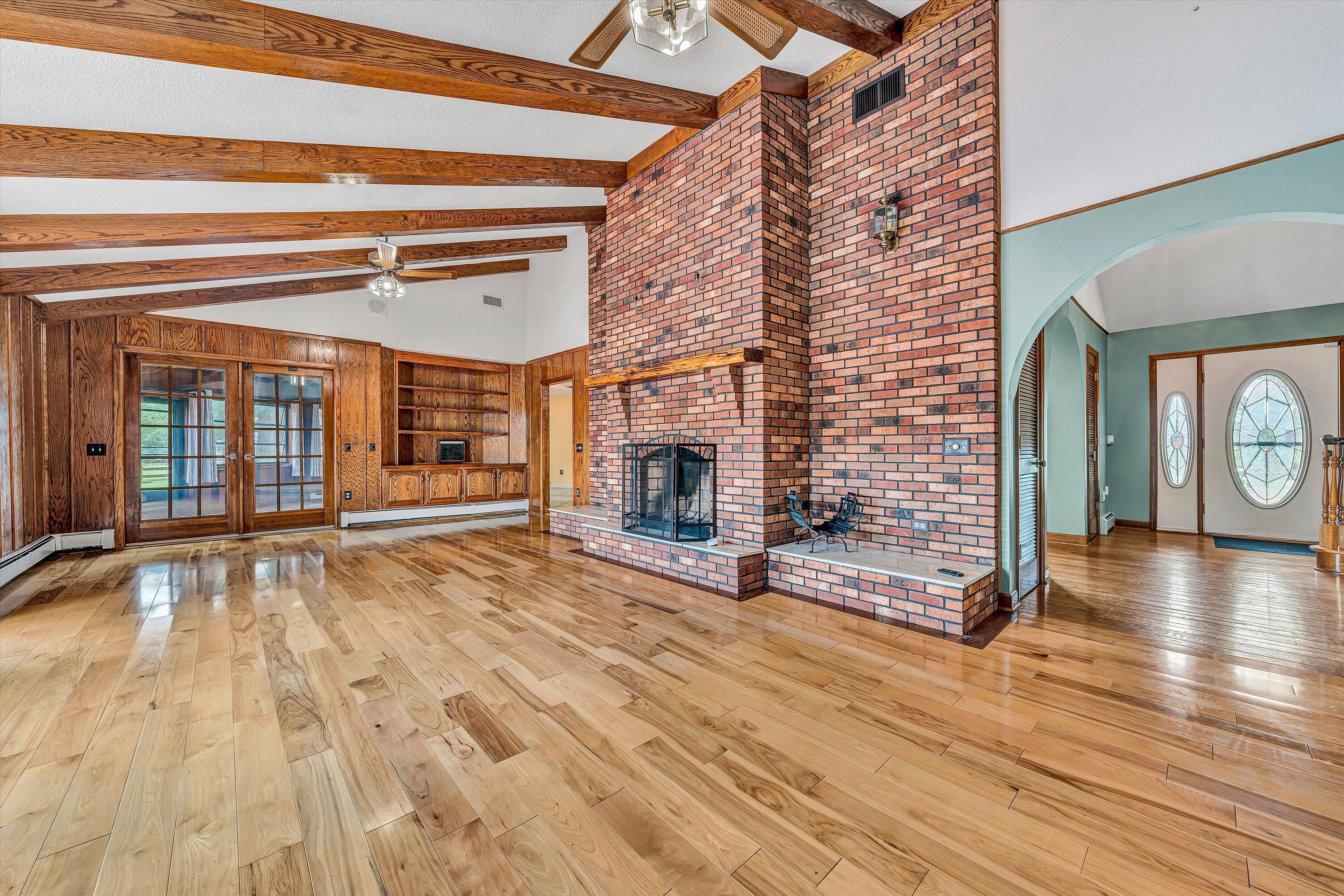 270 Parkside Lane Rocky Mount, VA 24151 - Photo 14 of 55 a view of a livingroom with wooden floor and a fireplace