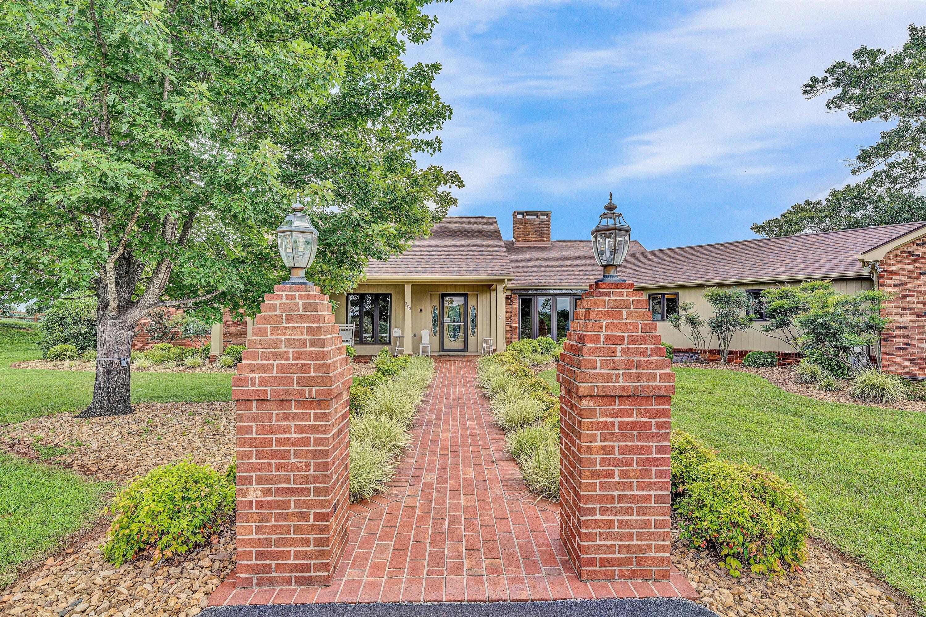 270 Parkside Lane Rocky Mount, VA 24151 - Photo 3 of 55 a front view of a house with garden