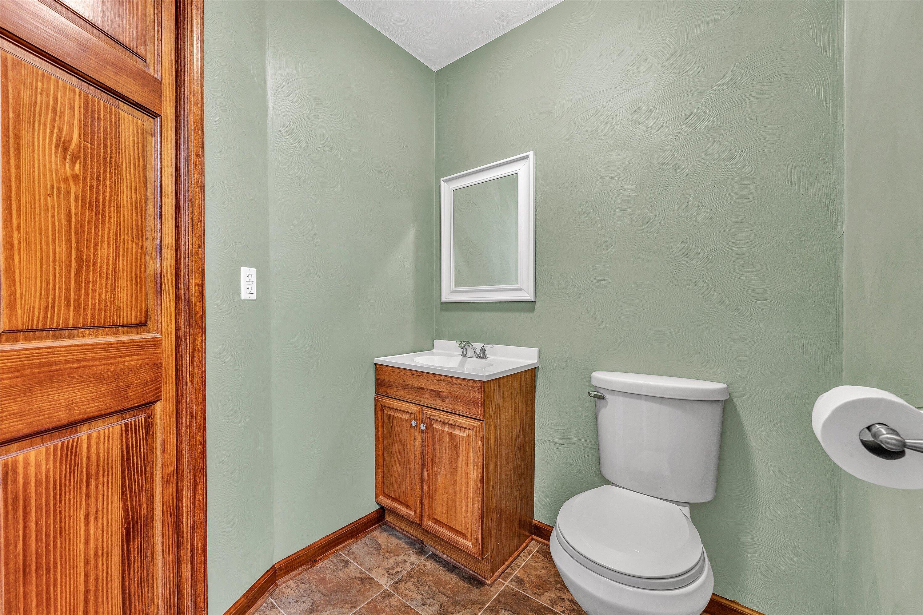 270 Parkside Lane Rocky Mount, VA 24151 - Photo 31 of 55 a bathroom with a toilet a sink and a window