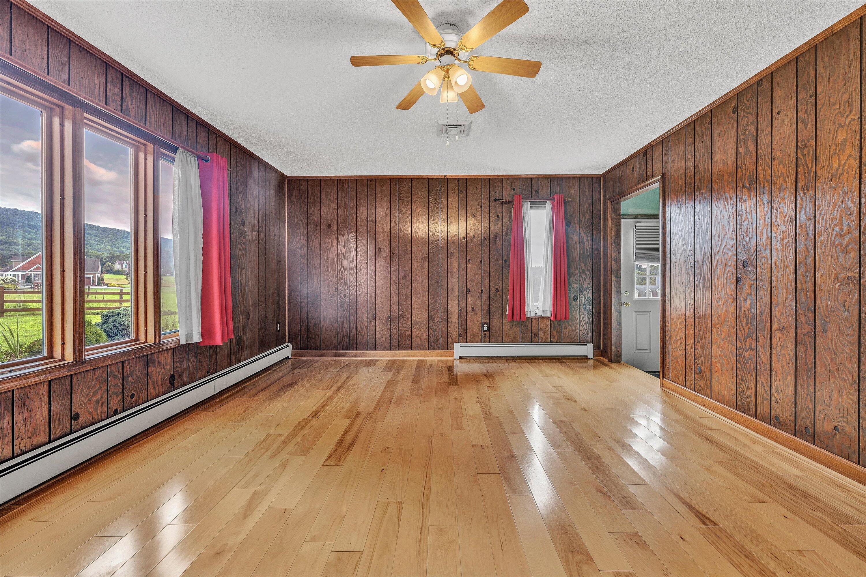 270 Parkside Lane Rocky Mount, VA 24151 - Photo 32 of 55 a view of an empty room with a window and a ceiling fan