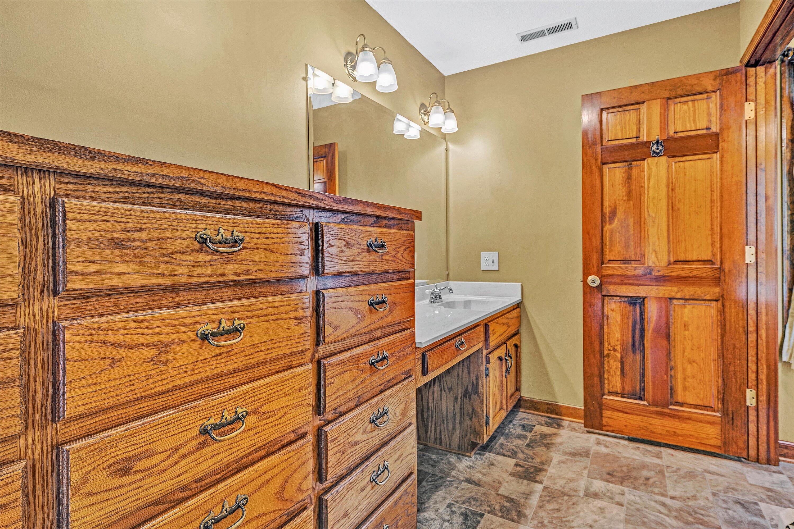 270 Parkside Lane Rocky Mount, VA 24151 - Photo 38 of 55 a bathroom with a sink a vanity and a mirror