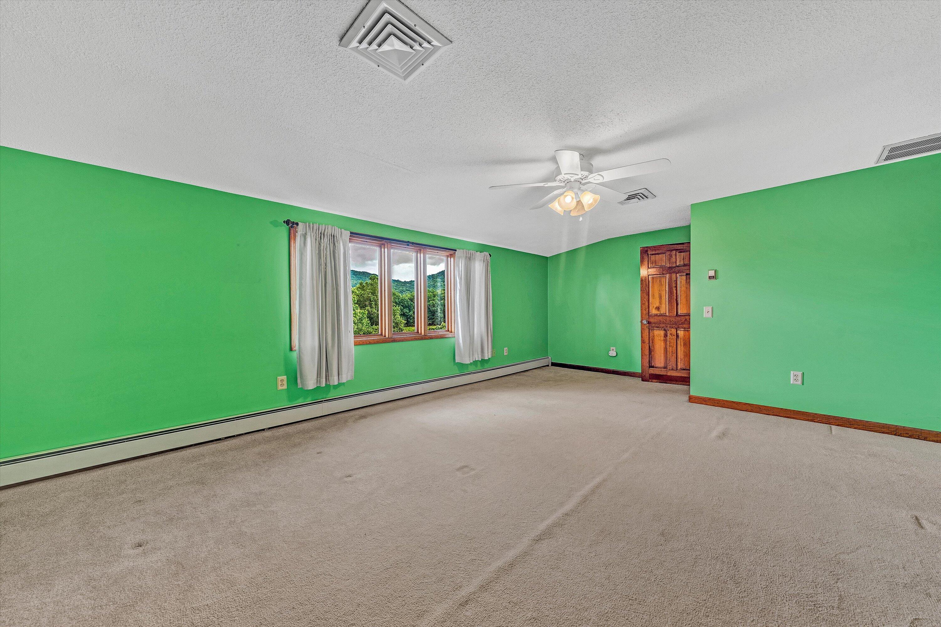 270 Parkside Lane Rocky Mount, VA 24151 - Photo 41 of 55 a view of a room with window and a ceiling fan